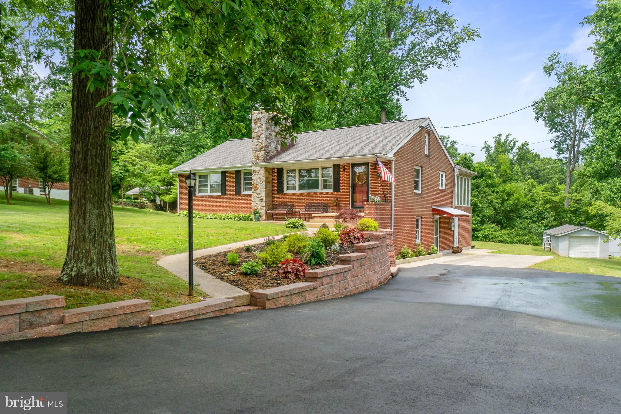 All brick rancher on a 3/4 acre lot with beautiful, mature landscaping. This home is almost 2100 sq.ft. of finished living space and features two fireplaces, hardwood floors in the living room and bedrooms, granite kitchen counter tops with under cabinet lighting, terrific breakfast room/dining area off of the kitchen with scenic views of the partially fenced back yard, nice sized deck, attached storage shed, and new laminate floors in the finished lower level! The bathroom in the primary bedroom is newly renovated and the roof is only 6 years old! The laundry room is in the unfinished area of the lower level however, the third bedroom on the main level does have washer & dryer hookups. Beautiful, industrial style finished lower level family room/study. The detached garage has ample space for the storage of one vehicle with additional storage space as well. Purrfect backyard Catio and dog ramp! Convenient location with easy access to I-95 and Rt. 40, as well as shopping, parks, restaurants and very convenient to Leidos Field at Ripken Stadium! Seller is offering buyer a one year Choice Ultimate home warranty!