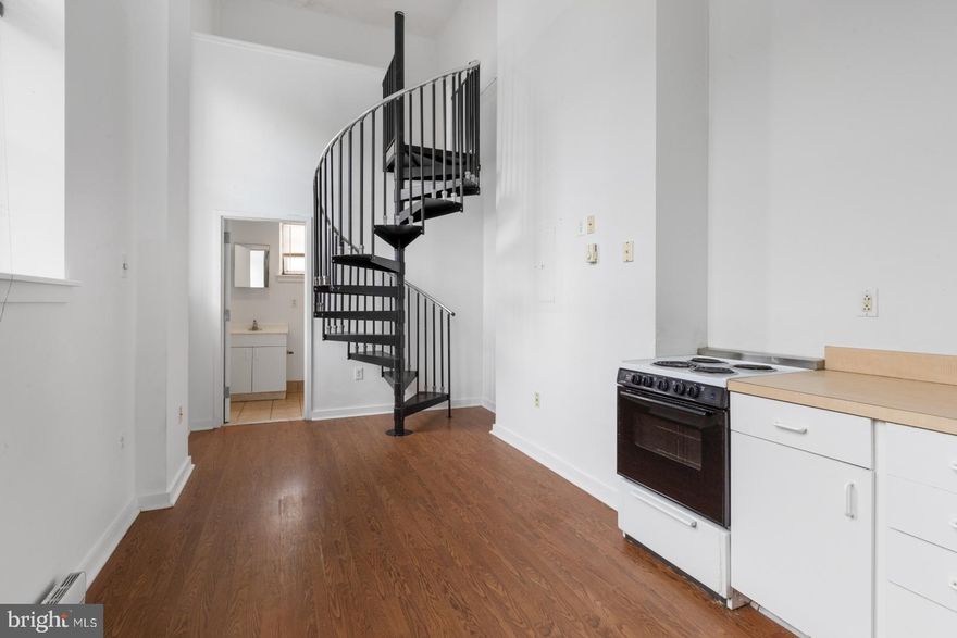 Available NOW:

109 W Wildey St #PH10 at the Schoolhouse Lofts! The Schoolhouse Lofts are a community of modern-industrial artist lofts inside the historic Daniel Boone School in Northern Liberties. This is a great Lofted Studio, 1 bathroom apartment located in a fantastic building offering an elevator, mailroom, minimalistic lighting fixtures, exposed beams, original brick work, and fantastically intricate original details. Enter the unit on the top floor into the common area. This space features hardwood floors, high ceilings, bright natural sunlight from the large windows, and an iron spiral staircase leading to your lofted bedroom area. The kitchen is towards the front and boasts white cabinetry and subway tile backsplash. High efficiency mini-split systems are installed throughout the unit to ensure year-round comfort. Continue straight back to your full bathroom equipped with a vanity, window, and bath-shower combo. Head upstairs to your cozy, lofted bed area. Located in a converted school building that brings a unique mix of old and new. The common areas such as the elevator, outdoor bike area, courtyard, Amazon Package Hub, and multiple laundry rooms are custom engineered to minimize stress and maximize well-being. There are FREE laundry rooms in the building, 1 on both the 1st & 2nd floors and 2 on the Penthouse Floor. Schedule a tour today!

About the Neighborhood:

Located in Northern Liberties and surrounded by some of the city’s best dining, shopping, and entertainment options. Easy access to highways I-95 and I-676, as well as public transportation with the Girard station for the Market-Frankford line just a block away. Close proximity to Penn Treaty Park, Piazza Dog Park, The Fillmore, and Brooklyn Bowl. Walking distance to Front Street Cafe, Urban Village Brewing Company, Jerry’s Bar, Barcade, Love & Honey Fried Chicken, Frankford Hall, The Kettle Black, and so many more!

Lease Terms:

Generally, first month, last month, and one month security deposit due at, or prior to, lease signing. Other terms may be required by Landlord. $55 application fee per applicant. Pets are conditional on owner’s approval and may require an additional fee and/or monthly pet rent, if accepted. (Generally, $500/dog and $250/cat, and/or monthly pet rent). Tenants responsible for: electric, gas, cable/internet, and water. Water & gas are billed by a 3rd party company, Conservice. Landlord Requirements: Applicants to make 3x the monthly rent in verifiable net income, credit history to be considered (i.e. no active collections), no evictions within the past 4 years, and must have a verifiable rental history with on-time rental payments. Exceptions to this criteria may exist under the law and will be considered.