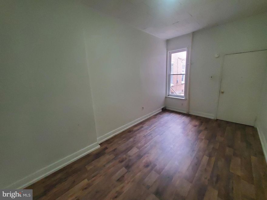 Very nice first floor apartment. This unit has 1-2 bedrooms, spacious kitchen, bathroom, and living room, and a private rear entrance with access to the back yard. Rent includes water, sewer, and trash. Tenant pays electric and gas; has heat and hot water. No smoking, cats negotiable.