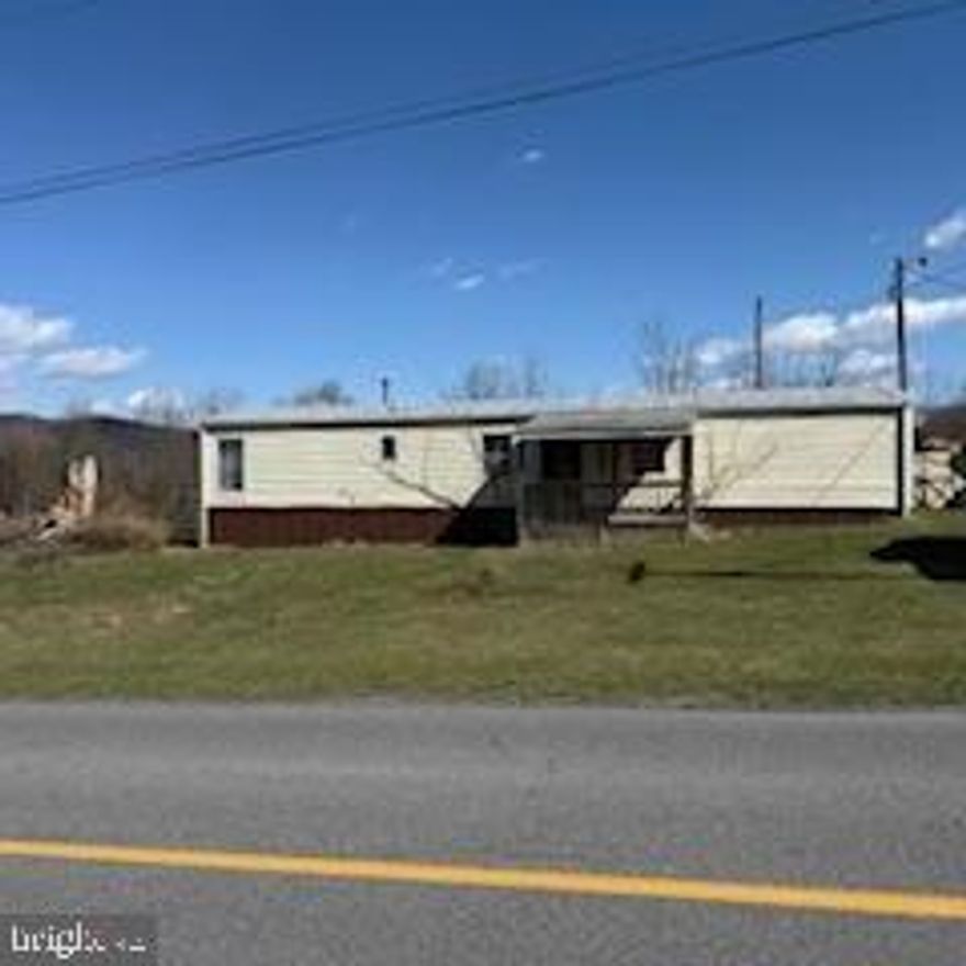 Investment Opportunity!! The home needs some TLC. It is a good investment property in a nice location—next door to the Lions Club Park. It has a nice flat backyard that joins the Lions Park.  The appliances convey that it has a newer washer and dryer.