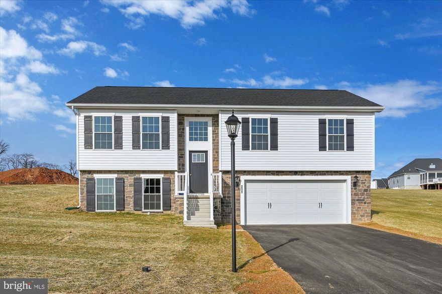 This is a TO BE BUILT home listed at the base price. You can choose this model or another model. ##Visit model home/on-site sales office at 2601 Village Rd, Dover PA for more information##
Incentive available with the use of one of our preferred lenders & title co.. 

The split foyer, LIBERTY is perfect for active, growing families or home-based businesses. Everything you need for a comfortable life is included on the main floor, including two full baths and a large eat-in-kitchen with an optional kitchen island.
The lower level can be whatever you want it to be…an office, den, game room, exercise room or a fourth bedroom and of course a laundry, bath, and garage. So versatile, so livable…be sure to check the exterior add on options for the Liberty.
Whether you’re a young family starting out or “empty nesters” scaling down, these smaller homes could be just right for you.
Although their square footage is limited, they display a generous, welcoming spirit and boast many of the architectural features so popular in larger homes.
Both floor plans are practical and well-proportioned, making it easy to alter or adapt to any homeowner’s needs.
The Liberty can be built on your land or choose a homesite in one of our new home communities and live your best life.