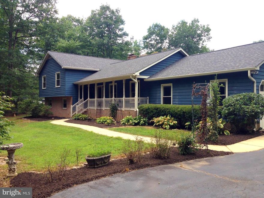 Renovated Throughout! Spacious 5 acre lot, Sun Room, Conveniently located off Rt. 610 w/ easy access to Stafford & Prince William Counties! Pull up paved drive to spacious 2 car garage, enter main level to find newly finished wood floors through out, tile & granite kitchen that opens to gorgeous sun room. The upper level offers 3 bedrooms and 2 full baths. LL tiled w/ wd st, rec rm, & living space