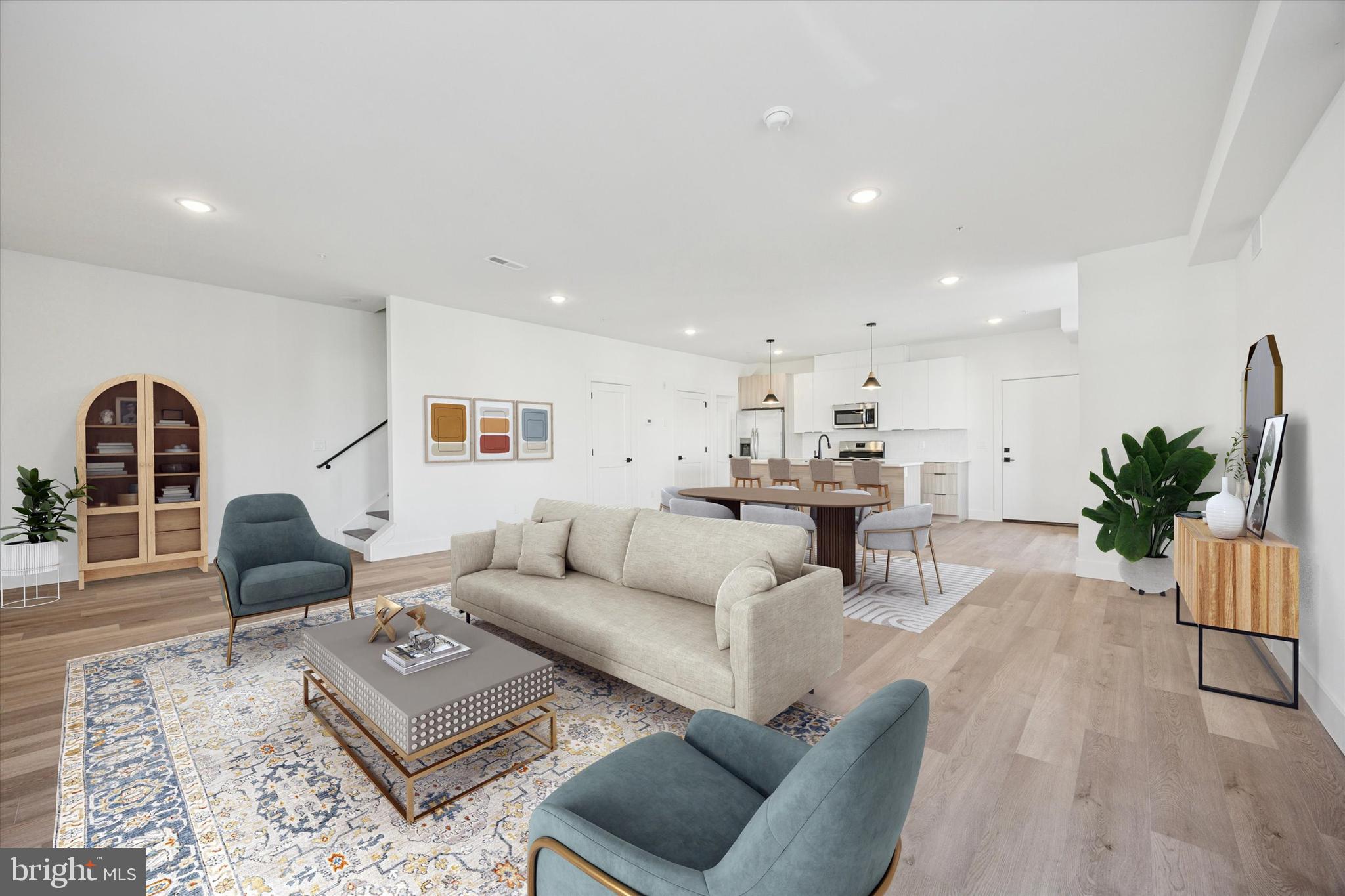 Welcome to this exceptional BRAND NEW four-unit condominium building, offering a unique blend of style, modern convenience, and versatility with a 10-year tax abatement as an added bonus. This listing is a bi-level on the third and fourth floor with a roof deck! Each of the four units is a rare 24 feet wide, open concept living and kitchen area, creating a sense of airy, welcoming space where your design aspirations can truly shine. The heart of the kitchen is the large, elegant stone island countertop, providing both a functional workspace and a gathering point for family and friends. All spaces have in-unit washer and dryer making laundry day a breeze, and huge walk-in closets and double vanities. Enjoy an abundance of natural light that filters through large windows, filling each unit with a warm and inviting ambiance. Wide-planked engineered oak hardwood floors add a touch of sophistication, and the modern kitchen cabinets are not only sleek but also offer ample storage, making daily life a breeze. Kitchens are equipped with separate pantry, under-cabinet trash storage and counter-depth refrigerators for efficient use of space. For those seeking extra flair and a taste of the high life, the two-bedroom, two-bath units offer something truly special. Outside, you'll find a private driveway, providing secure and convenient off-street parking for residents. With two parking spots available for purchase, you'll never have to worry about finding a place to park, a true rarity in urban living. In addition to the stylish and practical features, this property's location offers the best of both worlds: a tranquil retreat and easy access to urban amenities. Don't miss your chance to be a part of this vibrant community. These condos range in size from 1,415 to 1,726 square feet, ensuring that you have ample space to create your ideal living environment. Tour now and lock in your unit! Please inquire about pricing for the other units in the building.
Schedule a showing today and experience the elegance, convenience, and opportunity that this unique condominium building has to offer. Your dream home is waiting!