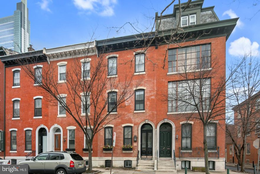 You'll be wowed by this very beautiful, stately 4 bedroom, 41/2 bath Victorian townhome combining original charm with contemporary amenities. It is located on a lovely street in the heart of LoganSquare, the city's cultural hub. There is amazing inside and outside ( wait till you see the fabulous roof deck!) space. The home is gracefully proportioned with grand entertaining spaces equally wonderful for comfortable living. The entry foyer has interior double doors with etched glass that open to a spacious living room and separate dining room each with decorative marble fireplaces, original wood floors, 12' ceilings, moldings. There is a powder room in the hallway that leads to a gorgeous, eat-in cook's kitchen with gleaming granite countertops, porcelain floors, a window wall with glass doors that open to a lovely patio with a grill for your outdoor cooking. The 2nd floor has a large library/office ( could be 5th bedroom) with bay windows, a fp, closet and built-in bookshelves. Step up to the laundry room with a washer and dryer then walk down the hall to an exquisite MBR suite with a wall of closets, fabulous new bath boasting a walk-in shower, soaking tub and glass tiles. Right off the bath is a huge walk-in closet.The 3rd fl includes a 2nd bedroom with good closet space, an open den/playroom/bonus room with a full bath. There is another full bath in the hallway and a 3rd bedroom with a wall of closets. Stairs lead to a sensational roof deck with dazzling city views  large enough for a dining table and separate lounge area with a retractable awning - and there is a self watering system for the plants! The finished basement is a great TV room and houses a 4th bedroom with a full stall shower bath and  abundant storage space. This magnificent home offers easy easy access to the amenities of city living-come see it and fall in love !