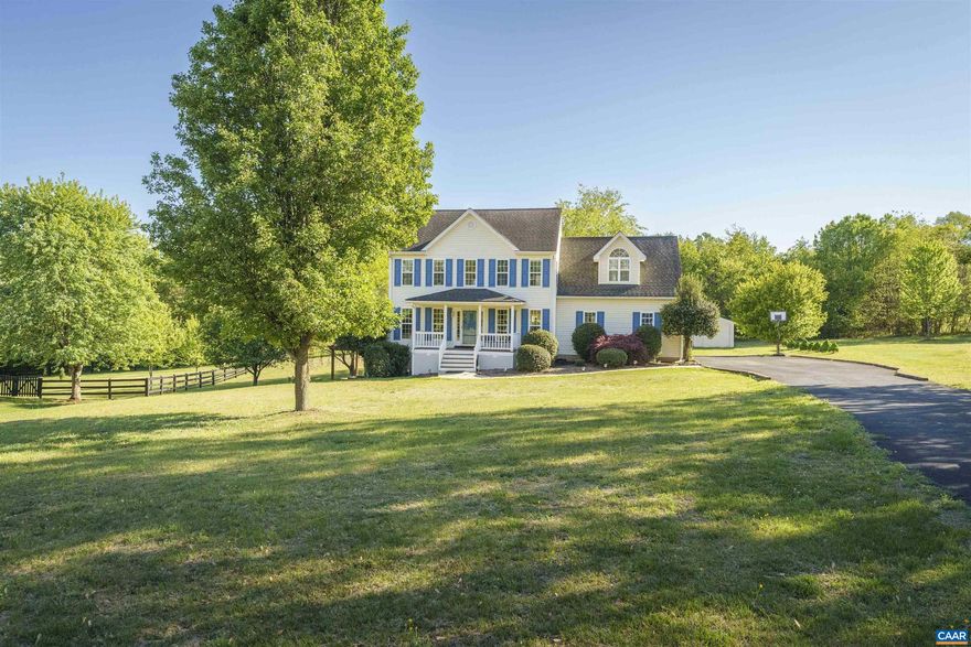 A 4-bedroom, 3.5-bath colonial with a separately accessed 814 finished square feet lower-level apartment: one bedroom, an additional flex room, full kitchen, full bath, in-unit laundry, private exterior entrance. The lower level works as extended family quarters, a guest space, or a dedicated home office. It has also been used as income: most recently rented at $2,000 per month. The main residence offers 2,134 finished square feet above grade, hardwood floors, gas fireplace, attached 2-car garage, and sits on a landscaped 0.76-acre lot. Outside: wood deck, concrete patio with pergola, fire pit, storage shed, and a cleared, gently rolling yard set back from a quiet cul-de-sac. Twenty minutes to Charlottesville. Minutes to NGIC and DIA. Designed as one home, functions as two.,Formica Counter,Wood Cabinets,Fireplace in Living Room