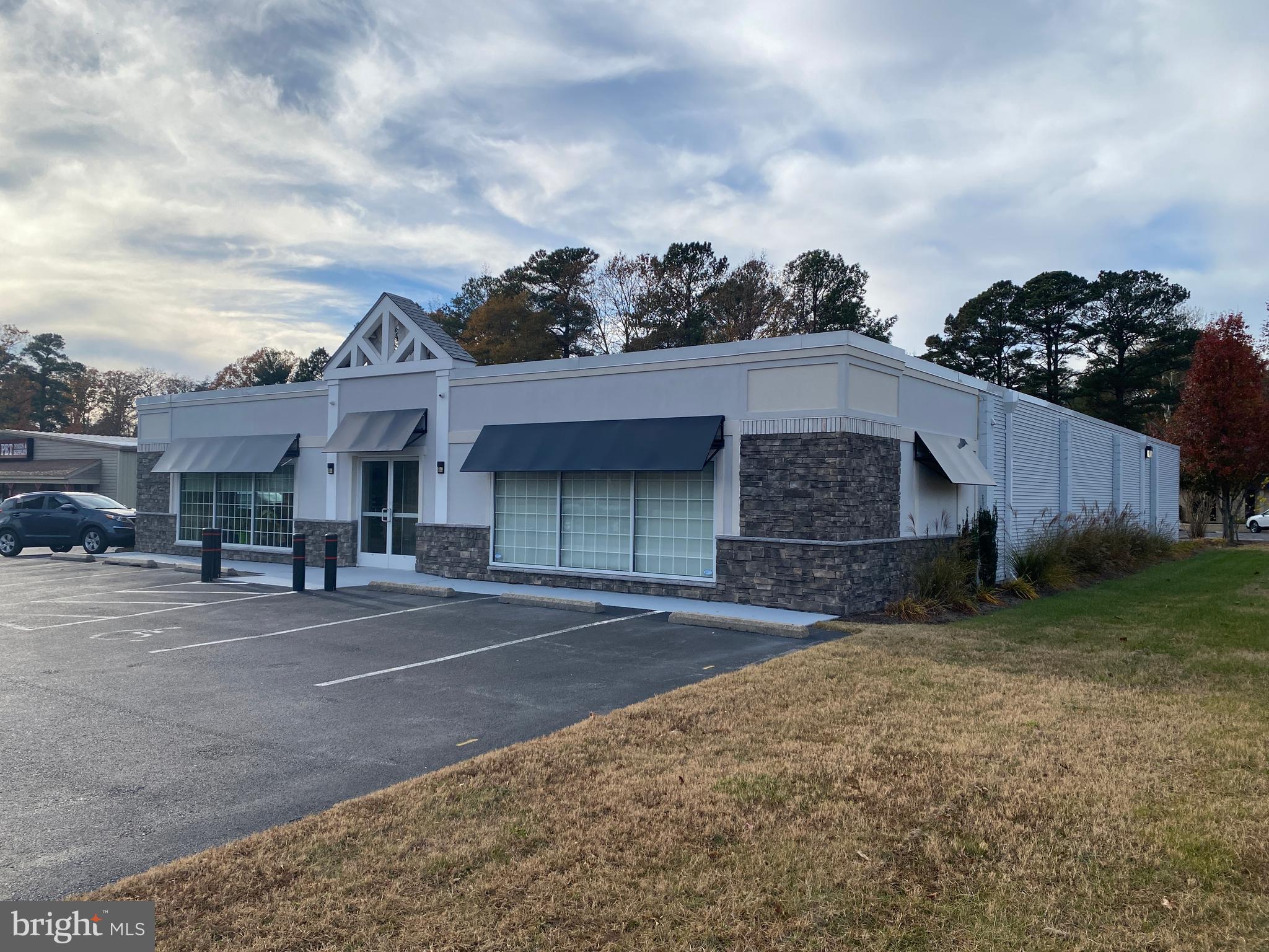 Office/ Retail space fronting Route 13 featuring a Lobby/ Showroom, 3 Private offices, Storage room, & 1 bathroom. This is one of two units in a free standing 6,000 SF property on .41 acres boasting a recently renovated facade. Currently home to Telewire who is occupying the majority of the space, Situated in a highly visible location with traffic counts exceeding 28,000 vehicles per day. Its proximity to Salisbury University, just down the street adds too its appeal, making it an ideal location for businesses seeking a connection with the bustling academic community.