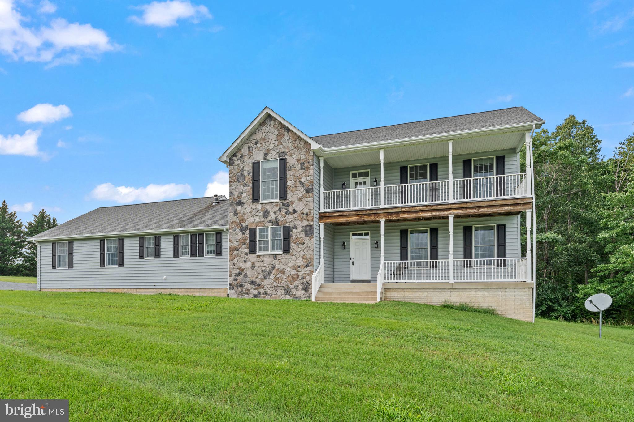 *PRICE REDUCED!!* Welcome to 19661 Edwards Shop Rd.,– Your MOVE IN READY Private Colonial Retreat on Over 5 Acres on the east side of Culpeper county.
Nestled just off Route 3 between Culpeper and Fredericksburg, this charming 4-bedroom, 2.5-bath home offers the perfect balance of rural serenity and commuter convenience. Tucked away from the road for added privacy and peace of mind, the home sits on a picturesque 5+ acre lot, providing ample space for outdoor living, gardening, or simply soaking in the peaceful countryside.
The main-level primary suite offers comfort and accessibility, while the upper level features three bedrooms, a full bath, and a rare bonus—an upper-level porch directly off the center hallway. Whether you're enjoying your morning coffee or winding down at sunset, both of the front porches provide beautiful country views of the neighboring farm.
Inside, the home is filled with generous living spaces and timeless appeal. The lot itself offers endless potential for creating your dream outdoor oasis—imagine fire pit nights, garden beds, or even a future pool. 2 car garage and long driveway offers ample space for all your vehicles and outdoor toys.
Don’t miss this opportunity to enjoy the beauty of Culpeper County living—peaceful, spacious, and perfectly positioned for those who crave country charm with access to nearby towns. Come experience the quiet life—just close enough to everything you need.