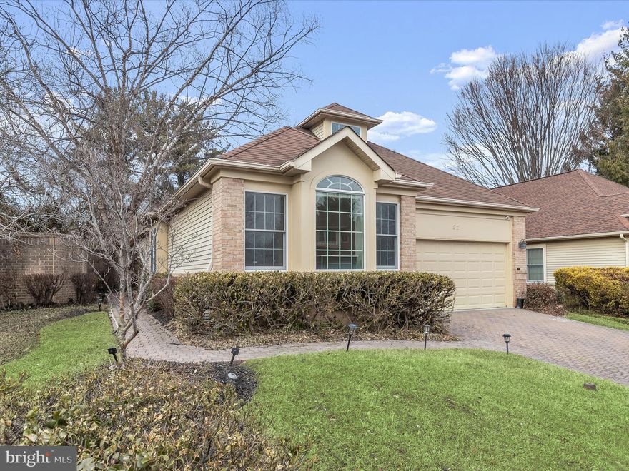 Nestled in the highly desirable Cobblestone community, this stunning home offers four bedrooms, three-full and one-half bathrooms, thoughtfully spread across two levels of comfortable living. Step inside to discover a welcoming neutral color palette, tall tray ceilings, and hardwood floors that create an airy, open atmosphere bathed in natural light. The eat-in kitchen boasts granite countertops, stainless steel appliances, 42” cabinets, a center island, and a breakfast bar, all opening to the side patio. Just off the kitchen, the laundry room has a pantry, coat closet, and access to the two-car garage. The open-concept living and dining rooms are perfect for both modern living and hosting gatherings. French doors in the living room lead to the rear deck and fully fenced yard, while a cozy double-sided gas fireplace adds warmth and charm, shared with the primary bedroom. The primary suite is a true retreat and highlights a large walk-in closet, two additional closets, and a private bathroom complete with a jetted tub, frameless glass-enclosed walk-in shower and dual vanity. A convenient half bathroom rounds out this side of the main level. At the opposite end of the home, two additional bedrooms share a hallway bathroom with a tub-shower. Downstairs, the fully finished lower level expands the living space with a massive recreation room. This level also includes a fourth bedroom with a walk-in closet and an attached bathroom featuring a walk-in shower. The outdoors are just as inviting, with a fully fenced yard that includes a deck and patio for enjoying your surroundings. With a two-car garage and additional driveway parking, convenience is guaranteed. Located just off Reisterstown Road with easy access to 695 and 795, a wide variety of dining, shopping, and entertainment options are just moments away. Monthly HOA fee includes lawn and common area maintenance for a hassle-free lifestyle.