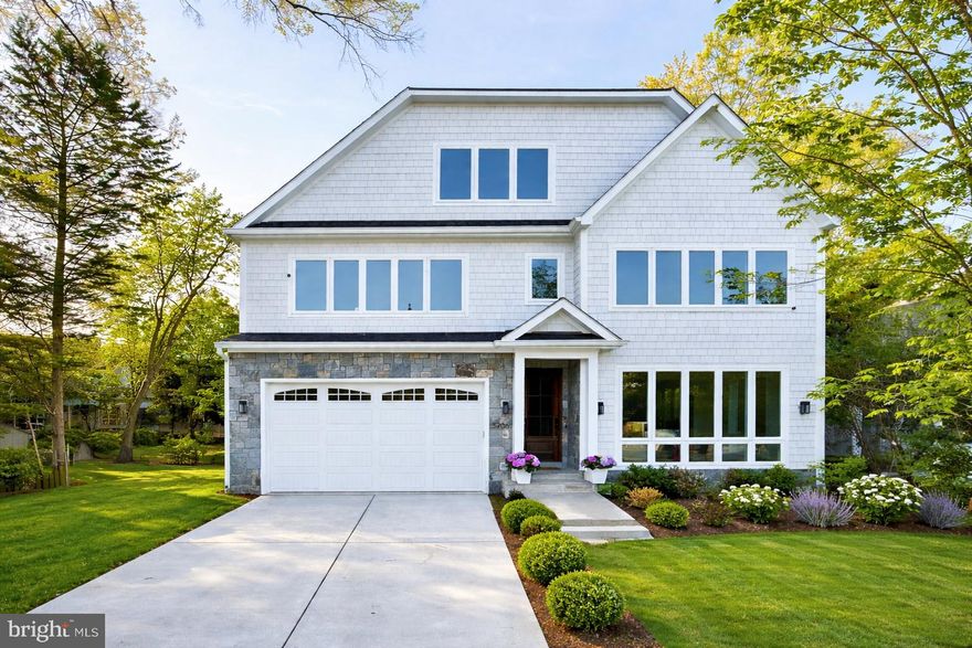 Beautifully crafted with quintessential Chevy Chase elegance, this exceptional 2024-built residence is ideally nestled in the highly coveted Chevy Chase Village Section 3.  Set on an expansive 10,637-square-foot lot, the home offers a rare sense of privacy and serenity—an oasis in the heart of one of the area’s most distinguished and vibrant communities, celebrated for its gazebo park, cherished neighborhood traditions, Saturday Farmer's market, dog park, and effortless access to boutique dining and local shopping.
Spanning four impeccably finished levels, this home showcases a refined architectural vision paired with elevated modern design and bespoke finishes throughout. A private elevator and attached two-car garage enhance everyday conveniences.  The chef’s kitchen serves as the heart of the home—designed for both grand-scale entertaining and intimate gatherings—flowing seamlessly into expansive indoor-outdoor living spaces.

The mature, lushly landscaped rear grounds create a private sanctuary, ideal for al fresco dining, entertaining, and quiet relaxation, surrounded by greenery.

Every detail has been meticulously curated with refined finishes to the thoughtfully designed living spaces; the home exudes understated luxury at every turn. The serene owner’s suite offers a true retreat, complemented by a spa-inspired bath.  All en-suite baths for each secondary bedroom. The fully finished lower level elevates entertaining with a stylish built-in bar and generous recreational space.

Perfectly situated near Rock Creek Park and Meadowbrook Stables, the residence offers an unmatched lifestyle of recreation and natural beauty, all within the Bethesda–Chevy Chase High School cluster, which includes the acclaimed International Baccalaureate (IB) program.

A rare offering of timeless elegance, modern comfort, and enduring sophistication in one of Chevy Chase Village Section 3's most sought-after enclaves.