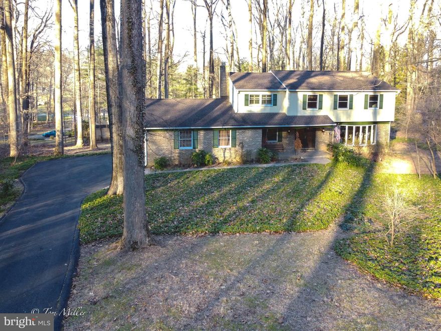 Nicely updated  4 bedroom,  3 bath traditional home  with a modern vibe in Velvet Ridge!. this home offers hardwood floors throughout and a 2 story foyer* fab updated kitchen with custom built hickory and glass cabinets, granite counters, ,SS appliances and island* spacious family room with brick fireplace*  all baths are recently updated* 3 season room off of kitchen and deck addition built in 2011*first floor office/ bonus room* Newer roof and 2015 Pella windows* new kitchen aid wall oven and refrigerator* new electrolux washer and dryer*  new water heater and constant pressure well pump* lower level formerly a sound recording studio* beautiful perennial gardens*  WOW..! All this and so much more!  Conveniently located to I 695, I 83 and Greenspring Station* OPEN HOUSE 1/24  1-245