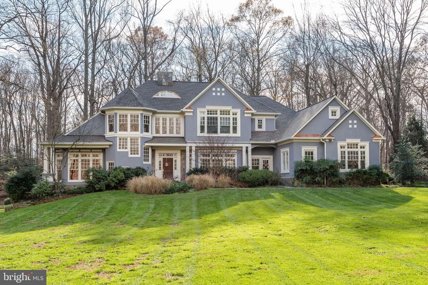 PRICE REDUCED!  Welcome to 7100 Saunders Court, an impressive Nantucket style stucco and stone home sited on one of the most incredible lots in all of Bethesda. This almost 3-acre flat, south-west facing private lot backs to Parkland and realizes some of the most spectacular sunsets imaginable.  Originally built by Ted Visnic in 1998, this home has been beautifully and tastefully renovated by the current owners where no detail was overlooked.  Some of the notable improvements are:  stunning chefs kitchen with commercial grade appliances and Calcatta Gold marble; sumptuous primary suite with exquisite marble bath and fantastic closets; gorgeous secondary baths; new roof with copper flashing and new gutters; freshly painted inside and out and beautifully refinished hardwood floors.  One of the special features of this house is the main floor bedroom with ensuite bathroom and multiple places to study and work.   The lower level features a large recreation room, bedroom and full bathroom, gym, sauna and second full bathroom and loads of storage.  Located just minutes from downtown Bethesda, the Beltway, great restaurants and shopping, (not to mention award-winning schools), you will be hard-pressed to find a home of this size and quality that compares.  Must see to believe.  Even the most discerning upper-bracket buyer will be impressed. Whitman school district.