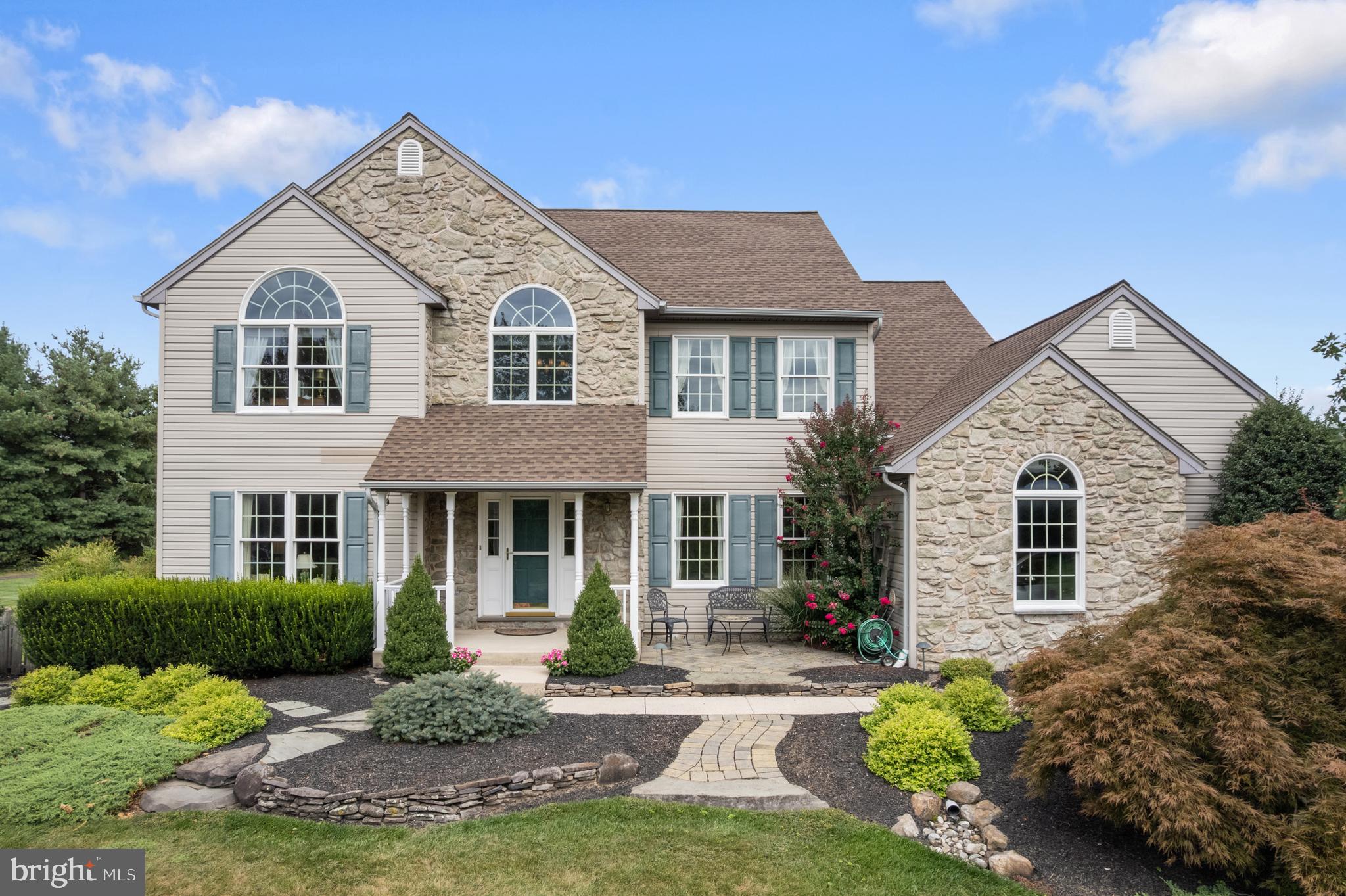 Welcome to 1010 Branch Mill Road—a beautifully maintained, custom-built, 4 bedroom, 2.5 bath home nestled in a peaceful cul-de-sac in the heart of Telford's picturesque farmland. Set on a generous 1.3-acre lot, this 2,894 square foot home offers the perfect blend of rural tranquility and modern convenience, with easy access to shopping, major roadways, and in the desirable Souderton Area School District. From the moment you arrive, you’ll be captivated by the serene setting and sweeping views that change beautifully with each season; from vibrant spring blooms and sun-filled summer days to colorful autumn foliage and peaceful winter snowfalls. Step inside to a grand two-story foyer that sets the tone. The spacious interior features tall ceilings, gleaming hardwood floors, crown molding, chair railing, and detailed wainscoting, adding timeless sophistication to every space. The front living room offers flexibility as a seating area, home office, or library, while the spacious formal dining room is perfect for hosting gatherings. The heart of the home is a bright and inviting kitchen with an adjacent dining area framed by a large bay window, flowing seamlessly into the warm and welcoming family room complete with a gas fireplace—ideal for everyday living and entertaining alike. Upstairs, you'll find three generously sized bedrooms with walk-in closets and abundant natural light. The master bedroom offers spectacular views, a sitting area, and a master bath with a soaking tub. This suite offers comfort and privacy, rounding out the perfect second floor retreat. Additional features include a charming powder room, a full laundry room conveniently located on the main floor, and a spacious basement with plenty of room for storage as well as a workshop area that is ideal for hobbies or DIY projects. Step outside to enjoy a private oasis with the professionally landscaped backyard, complete with paver walkways and a large deck. A storage shed is included to help keep the 2-car garage free from clutter with plenty of room to park your cars. In the event of a power outage this home comes with a whole house generator that will keep the lights on. This is more than just a house, it's a home that combines peaceful rural living with the everyday conveniences you need. Don’t miss your chance to experience the comfort, space, and serenity that 1010 Branch Mill Road has to offer. Schedule your private tour today!