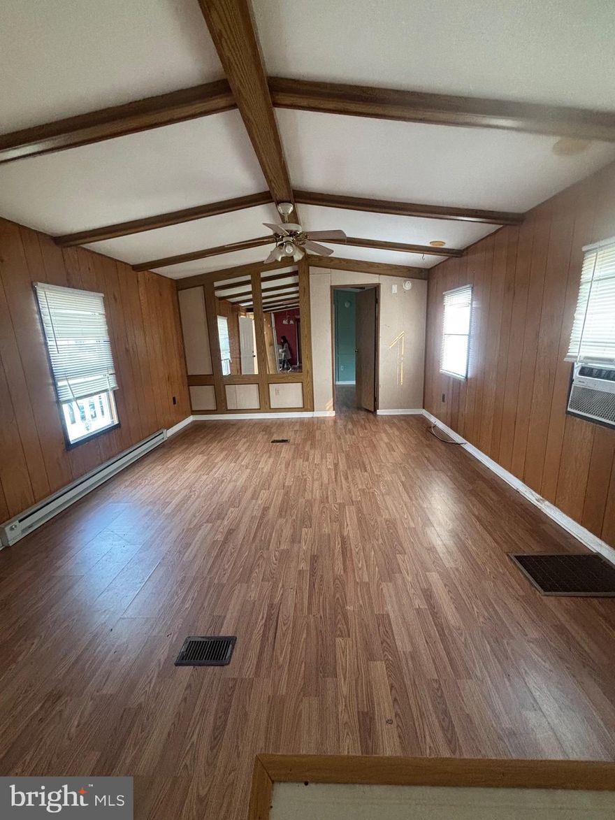 This house is being sold with 2 parcels, one parcel has this home on it and the other parcel has another home on it, both homes back up to one another and share a septic. The second parcel is being rented out on a month to month lease for 600 a month. 

second parcel is listed in MLS as DESU 2101356