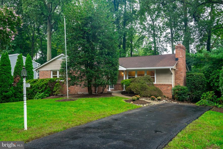 Popular Annapolis Neighborhood with  community pool & available boat slips for only $695.00 per year (HOA fee).  Lovely curb appeal, professional landscaping, and an endearing covered front entrance. This home offers a comfortable  floor plan , generous sized living spaces, 4 bedrooms, and loads of potential! Hardwood floors & recessed lighting throughout main level. The primary bedroom is located on the main floor and includes a walk-in closet & bath with separate jacuzzi whirlpool tub, shower, & custom vanity.   Three additional bedrooms, open concept Living / Dining area, updated Kitchen w/ built-in work space, & a fantastic light-filled  Sunroom with vaulted ceiling, skylights & ceiling fan that sits off the finished lower level Family room. Generator. Backs to woods for privacy. House sold "as is".