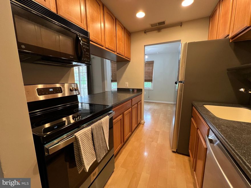 Move in ready. You will love this 2 bedroom, 1 bath condo. Enjoy this open floor plan with a updated kitchen. Located in close proximity to Dulles Airport, shopping and major highways. This quiet neighborhood makes coming home a pleasant experience. This home comes with a extra storage area on property and a covered balcony for that extra living space. This property has assigned parking and community amenities for grilling and picnics.