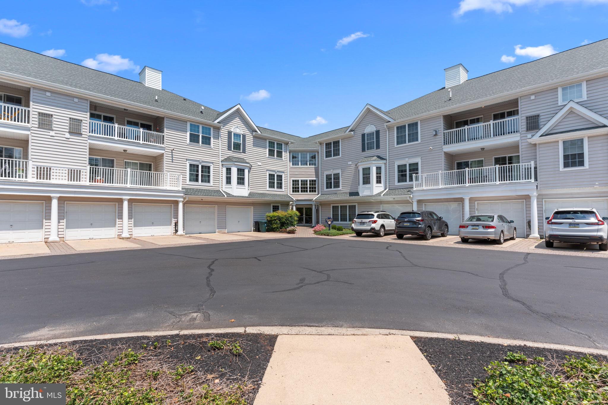 Come see Yardley Point, the hidden gem of Yardley. This 55+ development is tucked away on College Ave and provides a nice easy way to live. This 5 acre development provides a sweet quiet space with a natural bucolic setting. The exclusive entry, used only by residents, takes you to a parking lot where you can always find a space, if you do not park in your designated garage space, with inside entry. Upon entering the building, you use a key fob for security and the elevator to go to your designated door. Upon entry of 222, the coat closet is to your right and then you enter into the main area, providing a nice open feel. The family room and dining room combo has a slider to the deck and this opens to the kitchen as well. The kitchen provides counter space as well as an eat-in area, and also has a slider to the deck overlooking the open space in the back, overlooking the town of Yardley. Tucked away in the kitchen is the full sized laundry room. On the opposite side of this unit, are the bedrooms, each with their own bath. From this Yardley vantage point you can walk to all of Yardleys finest....restaurants, Coffee Shops, the Farmers Market, The Yardley Country Club, the Delaware Canal Towpath, and experience the historic downtown parades and Harvest Day, with just a short walk down the private connected path from the parking lot. This easy breezy lifestyle awaits its next rightful owner!