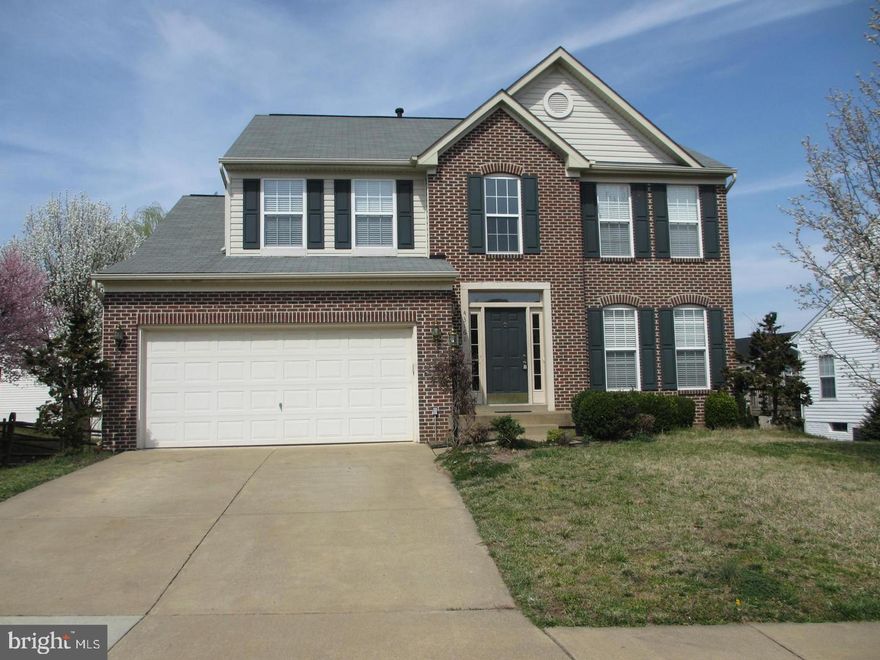 BEAUTIFUL AND SPACIOUS COLONIAL WITH THREE LEVELS FINISHED,  5 BEDROOMS, 3 FULL BATHS, ONE HALF BATH.  MANY NICE FEATURES INCLUDE : MAIN LEVEL ALL HARDWOOD FLOOR, LARGE LIVING ROOM, DINING ROOM, GOURMET KITCHEN WITH ALL STAINLESS STEEL APPLIANCES, KITCHEN ISLAND OPEN TO NICE SUNROOM/BREAKFAST ROOM, FAMILY ROOM WITH FIREPLACE. UPPER LEVEL WITH LARGE PRIMARY BEDROOM WITH WALK IN CLOSET AND LUXURY BA WITH DOUBLE VANITY, SOAKING TUB AND SEPARATE SHOWER, OTHER THREE GOOD SIZE BEDROOMS AND ONE FULL BATH, CONVENIENT LAUNDRY AREA ON UPPER LEVEL.  WALK OUT LOWER LEVEL FULLY FINISHED WITH NEW CERAMIC TILES FLOORS,  LARGE REC ROOM  WITH BAR, ONE BEDROOM AND ONE FULL BATH.  FULLY FENCED PRIVATE BACKYARD.  IN POPULAR POTOMAC STATION SUBDIVISION, CONVENIENT ACCESS TO ROUTE 7,  SHOPS.