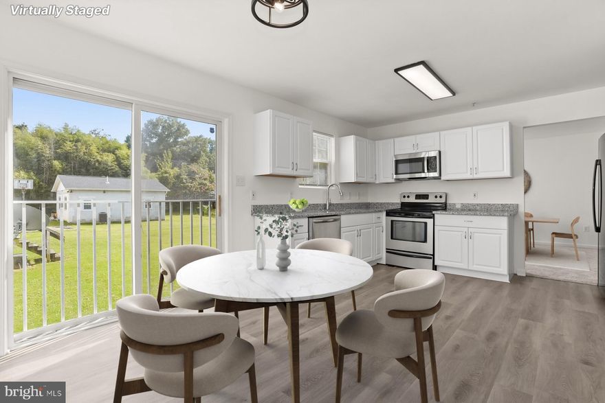 ***CORNER LOT*** Motivated seller willing to consider closing help and the Seller will entertain all offers. ! THE WHOLE HOUSE WAS REMODELED*. Welcome to an exceptional opportunity in the housing market! This elegant and freshly painted brick-front residence, nestled on a corner lot along a tranquil street, presents an enchanting combination of classic charm and contemporary luxury. With 3 bedrooms, 2.5 bathrooms, and an attached one-car garage, this completely renovated haven promises the finest in modern living. Stepping onto the premises, the curb appeal is evident, with the brick front adding a touch of timeless elegance to this corner-lot gem. As you approach the entrance, a sense of serenity envelops you, and the quietude of the street becomes palpable. The main level greets you with brand new luxury vinyl plank flooring, which graces the foyer, powder room, and kitchen, combining style with practicality.  Meanwhile, brand new wall-to-wall carpeting adorns the living room and dining room, imparting a sense of comfort and sophistication. Across the main level, a stunning upgraded kitchen that caters to the gourmet within. Featuring brand new cabinets, exquisite granite countertops, and new state-of-the-art stainless-steel appliances including a dishwasher and oven/range, this culinary haven is a masterpiece of both form and function. The double door pantry with shelving ensures you have room for all your kitchen essentials, while the sliding door to the future deck invites natural light and beckons you to enjoy alfresco dining. The upper level is a retreat unto itself. The primary bedroom boasts a generously sized double door walk-in closet, offering an abundance of storage space, while the updated ensuite bathroom elevates the space with a touch of distinction. Two additional bedrooms cater to your family's needs, and the updated full hallway bathroom with a linen closet ensures convenience and style. Descending to the lower level, you'll find a freshly painted stairway and floor that lead to a space brimming with potential. With four windows streaming in ample natural light, this area has already been thoughtfully framed out and is awaiting your personal touch to complete a finished basement. The washer and dryer are conveniently situated here, catering to your laundry needs. Additional features abound in this remarkable home. Brand new vanities, toilets, and fixtures grace all the bathrooms, exemplifying modern design and convenience. New recessed lighting casts a warm glow throughout, while the six-panel doors add a touch of sophistication. The double-pane windows, including bay windows in the living room and upper level front bedroom, not only enhance energy efficiency but also lend an inviting charm. Moreover, this home boasts an interior sprinkler system, ensuring an added layer of safety. The updated HVAC system underscores the home's commitment to your comfort. This property exemplifies the perfect fusion of classic aesthetics and contemporary convenience, offering an exceptional canvas for you to create your ideal living space. Close to schools, parks, shopping, and public buses right up the street.