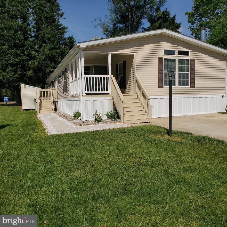 Buyer must be pre-approved by Boones estates to buy home .and they are to be  pre -qualified with a mobile home lender or have proof of funds. Roomy double wide with new interior  paint, blinds, smoke and carbon  detectors 4br 2 bath. Master bedroom with walk-in closet master bath has duel sinks corner garden tub with separate shower. Fire place in home. Community has inground pool, basketball and tennis courts, kids playground.   Even a pond and close to Patuxent river for fishing. Lot rent is $1175.00 monthly.