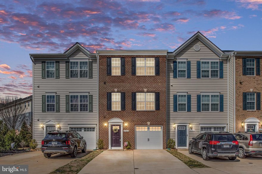 MOVE IN READY!!!  WELCOME TO THIS 3-LEVEL BRICK FRONT NEWER TOWNHOME IN THE CONVENIENTLY LOCATED LAKESIDE COMMUNITY. A SPACIOUS BOTTOM-UP FLOOR PLAN (3 BEDROOMS 2 FULL BATHROOMS AND 2 HALF BATHROOMS) INCLUDES A 1 CAR GARAGE WITH A 19 X 15 FOOT REAR RECREATION ROOM ON THE FIRST LEVEL. THE MAIN LIVING OPEN AREA INCLUDES 9 FOOT CEILING, HARWOOD FLOORS THROUGHOUT WITH FAMILY ROOM, DINING ROOM AND GOURMET KITCHEN AREAS HAVING CUSTOM WINDOW BLINDS AND RECESSED LIGHTING. A SLIDER DOOR LEADING TO A 14X10 FOOT PRIVATE TREK DECK SPACE AWAITS THOSE SPECIAL RELAXATION TIMES. AN INVITING SECOND-FLOOR KITCHEN CENTER PIECE IS AN OVERSIZED 8-FOOT GRANITE COUNTERTOP ISLAND WITH MASSIVE CABINET STORAGE, READY FOR ENTERTAINING THAT CAN EASILY INCLUDE DINING ROOM SPACE FOR MORE SEATING. A CUSTOM BACKSPLASH DESIGN ACCENTS THE KENMORE STAINLESS STEEL APPLIANCES, 42 INCH CABINETS, DEEP SINK, AND A SPACIOUS PANTRY. THIRD LEVEL LIVING FEATURES A LAUNDRY ROOM CENTRALLY LOCATED TO ALL 3 BEDROOMS. THE PRIMARY BEDROOM DESIGN TRAITS INCLUDE A CATHEDRAL CEILING, CEILING FAN/LIGHT WITH LARGE WALK-IN CLOSET AND A BATHROOM WITH A DOUBLE VANITY, OVERSIZED SHOWER, AND A PRIVATE COMMODE AREA. BEDROOMS 2 AND 3 OFFER SPACIOUS CLOSETS AND ENOUGH AREA FOR OPTIONAL USES SUCH AS AN OFFICE OR GAMING ROOM. THE COMMUNITY HOA INCLUDES MAINTAINED WALKING TRAILS WITH 2 PONDS, A PLAYGROUND, TRASH AND RECYCLING PICKUP, SNOW REMOVAL AND NUMEROUS DESIGNATED VISITOR PARKING SPOTS. MINUTES AWAY FROM EVERYTHING IN ANY DIRECTION WITH QUICK ACCESS TO I95, RT1, RT17/2, HISTORIC FREDERICKSBURG AND 2 VIRGINIA RAIL EXPRESS STATIONS. CLOSE TO MEDICAL FACILITIES, A HOSPITAL, LOTS OF SHOPPING, A COMMUNITY COLLEGE CAMPUS AND MANY LOCAL AND CHAIN BRAND RESTAURANTS.  SELLER DESIRES QUICK SETTLEMENT.  MAKE THIS YOUR HOME TODAY!!!