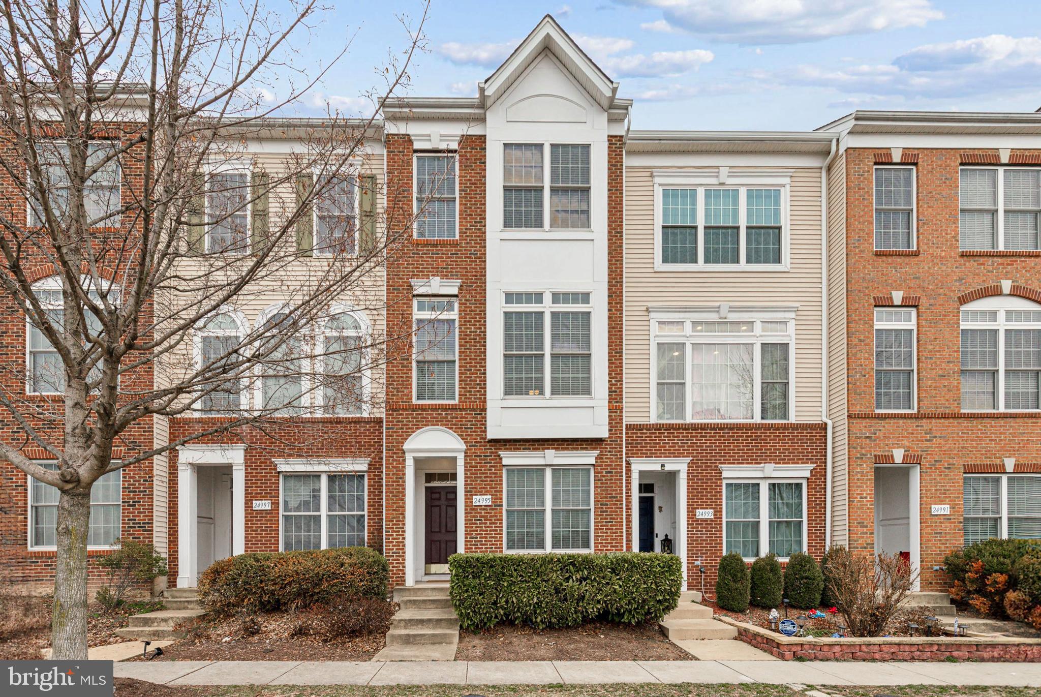 Welcome to sought after South Riding! This 3 level townhome is beautifully renovated & freshly painted in 2024 with 3 bedrooms, 3.5 bathrooms and 1 car garage. Updates throughout! The main level of the home offers an open floor plan including a living room, kitchen, half bathroom and dining area. The kitchen has updated granite counters, ceramic tile backsplash, 5 burner gas range, built in microwave, side by side refrigerator and pantry. Enjoy entertaining on the deck right off the kitchen! Separate laundry room is on the main level with recently replaced washer and dryer. The upper level has a primary bedroom with vaulted ceiling, walk-in closet and primary bathroom. The primary bathroom has been renovated and has a freshly painted (2024) dual vanity, new counters (2024) & lighting as well as a walk-in shower. There is a 2nd bedroom on the upper level and 2nd full bathroom offering new lighting/faucet & freshly painted cabinets (2024). The lower level has third bedroom with third full bathroom. Other recent updates include HVAC with digital thermostat, garage door opener, luxury vinyl plank flooring, lighting, faucets, garbage disposal. Ample parking with garage, driveway pad and street parking in front of home. Oversized garage with additional storage area. Home is located close to schools and across the street from the Dulles South Recreation and Community Center. Enjoy all of the amenities South Riding has to offer including swimming pools, bike/walk trails, dog park, soccer fields, baseball fields, tennis courts, golf course membership available, and more. Easy access to shopping, restaurants, major commuter routes and the Dulles International Airport. Home is being sold as a part of a 1031 exchange.