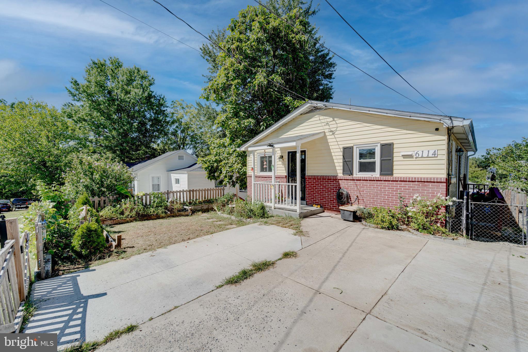 Welcome to this charming and updated 4-bedroom, 2-bath home with a den, ideally located just minutes from Route 50 and the B/W Parkway. A welcoming front porch sets the tone before stepping inside, where you’ll find a thoughtfully updated interior. The beautifully renovated kitchen features modern finishes and flows seamlessly into the main level, which includes three versatile bedrooms—one currently used as a dining room but easily convertible back into a bedroom. The lower level offers a spacious retreat with an oversized bedroom, private bath, walk-in closet, and a bonus den, perfect for a home office or guest space. Outdoor living is a highlight, with a rear deck overlooking gorgeous sunsets, plus a newly built patio underneath for added entertaining space. Additional updates include a new kitchen fan, new microwave, and an expanded driveway for convenience.
