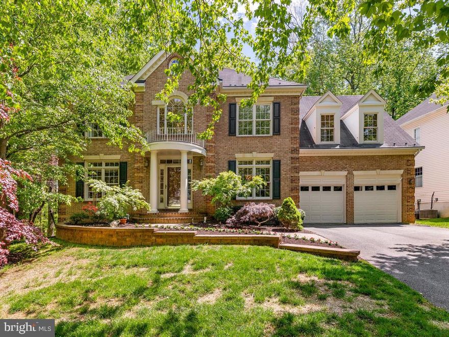 Tour through one of the largest Manor Homes in Gold Mine Crossing on one of the most lush and private lots in town (Click on Video/3-D)! Situated next to conservation lot, you will enjoy the tranquility and forest-like feel. Like you're  own Mountain Get-Away, yet seconds to everything! Brick entryway invites you into a beautiful two-story foyer. Just refinished hardwoods grace the entire main level, center staircase, and upper hall.  Formal Living and Dining Rooms on either side of elegant two-story foyer. Steps down the hallway, enjoy your private Library. Welcoming family room & gourmet's dream kitchen make entertaining a joy! Two tiered deck and brick patio lead to  peaceful and tranquil yard. A history-buffs delight, you may find artifacts dating back to the The War of 1812. Truly a unique property. The owner's suite features a romantic sitting room and just remodeled Owner's Garden Bath w/separate shower, jetted tub, water closet, and two vanities. Two more full baths make every bedroom a  Suite! All have walk-in closets. Upper Level Laundry Room.  Rec-room boasts a full wet bar, ample space for Media, games, with level walk-out to  lower level deck and brick patio. Pool Table may convey. Spacious lower level bedroom & elegant full bath, plus tons of storage. Whole-house generator; WSSC Sub Meter; Gutter Guards. Great views from every window! Great community with tot-lot a few steps away, side walks, mature trees. Truly ONE OF A KIND!