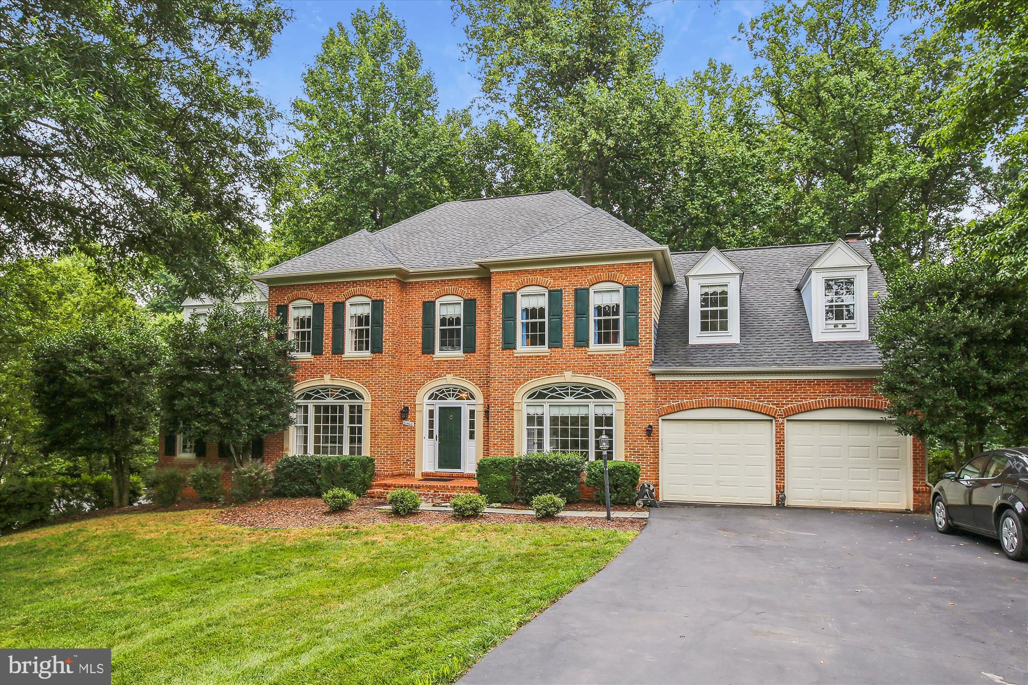 HUGE PRICE CHANGE - Step into a life that energizes you the moment you arrive—welcome to The Estates of North Hills, one of North Reston’s signature neighborhoods. This stately brick home commands more than half an acre in a quiet cul-de-sac, offering 7+ bedrooms, 4.5 baths, and a floor plan designed to elevate your day-to-day performance. Picture sunlight pouring through Palladian windows, hardwood floors guiding you from an elegant living room to a vaulted family room with a wood-burning fireplace. A dedicated home office empowers focused achievement, while a sunroom—sharing a two-sided gas fireplace—invites restorative calm.
The kitchen fuels both body and spirit with white cabinetry, stainless-steel appliances, gas cooking on the island, plus a pantry closet - ready for any culinary ambition.
Upstairs, the primary suite becomes your private retreat: a sitting room for reflection, a walk-in closet that organizes success, and a spa-style bath with soaking tub and dual sinks that recharge your momentum. Four additional bedrooms with custom closet built-ins and two hall baths keep family and guests thriving.
The walk-out lower level unlocks even greater potential: a vast recreation room, bedroom #6, full bath #4, abundant storage, and a home gym—or seventh bedroom—ready for your next breakthrough. A 2021 roof ensures confidence for years ahead. Step outside to decks overlooking wooded vistas, then tap into Reston’s renowned amenities—pools, trails, pickleball, tennis, vibrant programming at the Cultural Center, plus instant access to Reston Town Center, Metro, Route 7, the Toll Road, and Dulles Airport.
Opportunities of this caliber are rare. Claim this superior value in North Reston and elevate the way you live—starting today.
Located near Reston Town Center, Reston Hospital, dining, shopping, metro and commuter routes of Route 7 and Toll Road and Dulles Airport. The Reston community is very popular - offering pools, walking trails, pickleball, tennis, a Cultural Community Center with many programs, lessons and more.