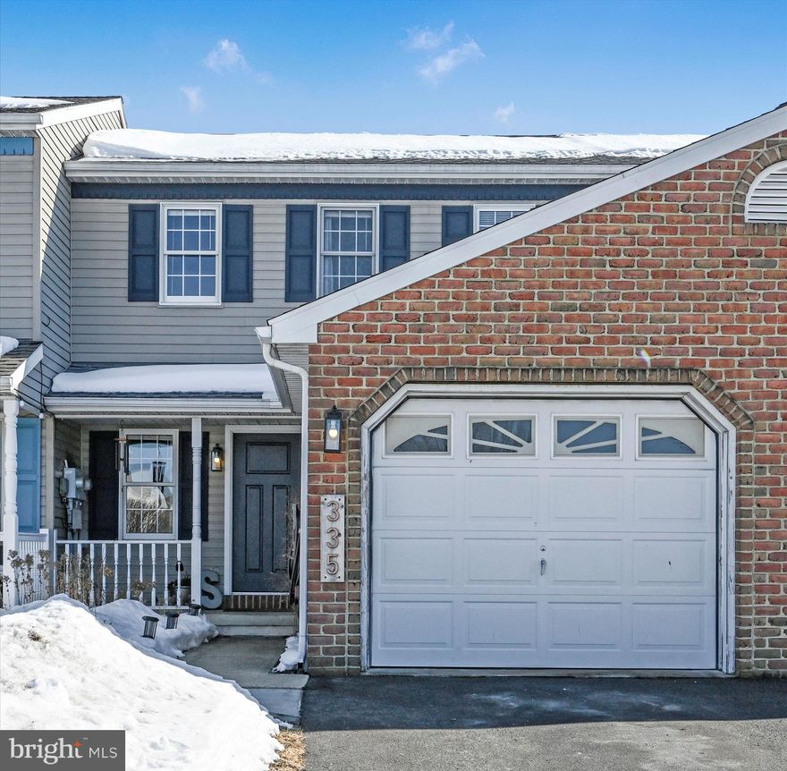 This turnkey townhome is ready to welcome you in! Step inside to beautifully maintained living spaces with recessed lighting, central air, and a convenient half bath on the main level. Upstairs, all three bedrooms share a full bathroom with a double sink vanity, combining style and practicality.

A pull-down attic offers finished, easily accessible storage — perfect for seasonal items and extras. The finished basement adds flexible space with a cozy fireplace and dedicated laundry area, ideal for movie nights, hobbies, or a home office. Outside, enjoy the 14x20 deck with hardwired lighting, including lights on each step down to the yard. Privacy fencing on both sides of the deck creates a welcoming retreat for relaxing or entertaining. The fully insulated garage currently functions as a workshop but can easily be converted back to traditional garage space by removing cabinetry. This home offers peace of mind with a newer roof and furnace.

Move-in ready and thoughtfully updated, this townhome blends comfort, functionality, and lifestyle in one complete package. Ring the doorbell before you go- you won't be disappointed.