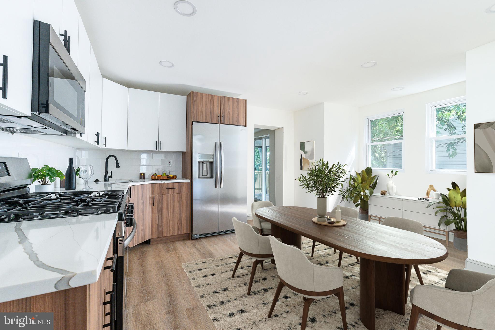 Welcome to 632 Chain Street, a thoughtfully renovated, move-in-ready home offering over 2,000 sq. ft. of living space and a private 2-car driveway. The charm begins outside with an eye-catching facade featuring dark grey siding and black accents. Inside you're greeted by an expansive, light-filled living room, enhanced by the added bonus of a side yard directly adjacent to the home. Continue to the large eat-in kitchen, where modern two-tone cabinetry, a full stainless steel appliance package including a dishwasher and over-the-range microwave, and plenty of space for a breakfast nook create the perfect blend of style and function. Sliding glass doors lead to the private back patio and side yard, ideal for outdoor entertaining. This level also features a convenient first-floor powder room, a laundry room, and direct access to the 2-car driveway. The second level boasts two generously sized bedrooms, a full bathroom, a hall closet, and a versatile bonus space, perfect for a home office or nursery. On the third floor, you'll find the spacious primary suite, complete with a huge walk-in closet and a luxurious, fully tiled en-suite bathroom featuring a rainfall shower. Completing the home is a large unfinished basement, offering additional storage or potential for future customization. Conveniently located near local attractions like the Elmwood Park Zoo and Norristown Farm Park, this home offers easy access to SEPTA Regional Rail and major commuting routes making it perfect for those who appreciate both suburban comfort and effortless connectivity to the city.