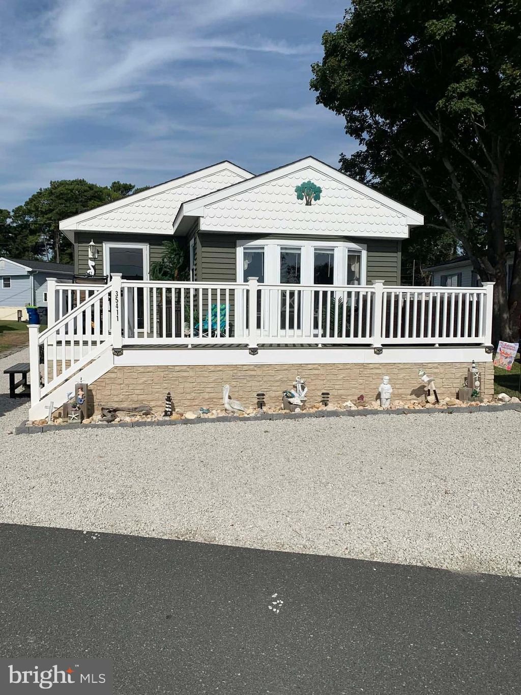 Photo of 35411 W River Drive, MILLSBORO, DE 19966 (MLS # DESU2110568)