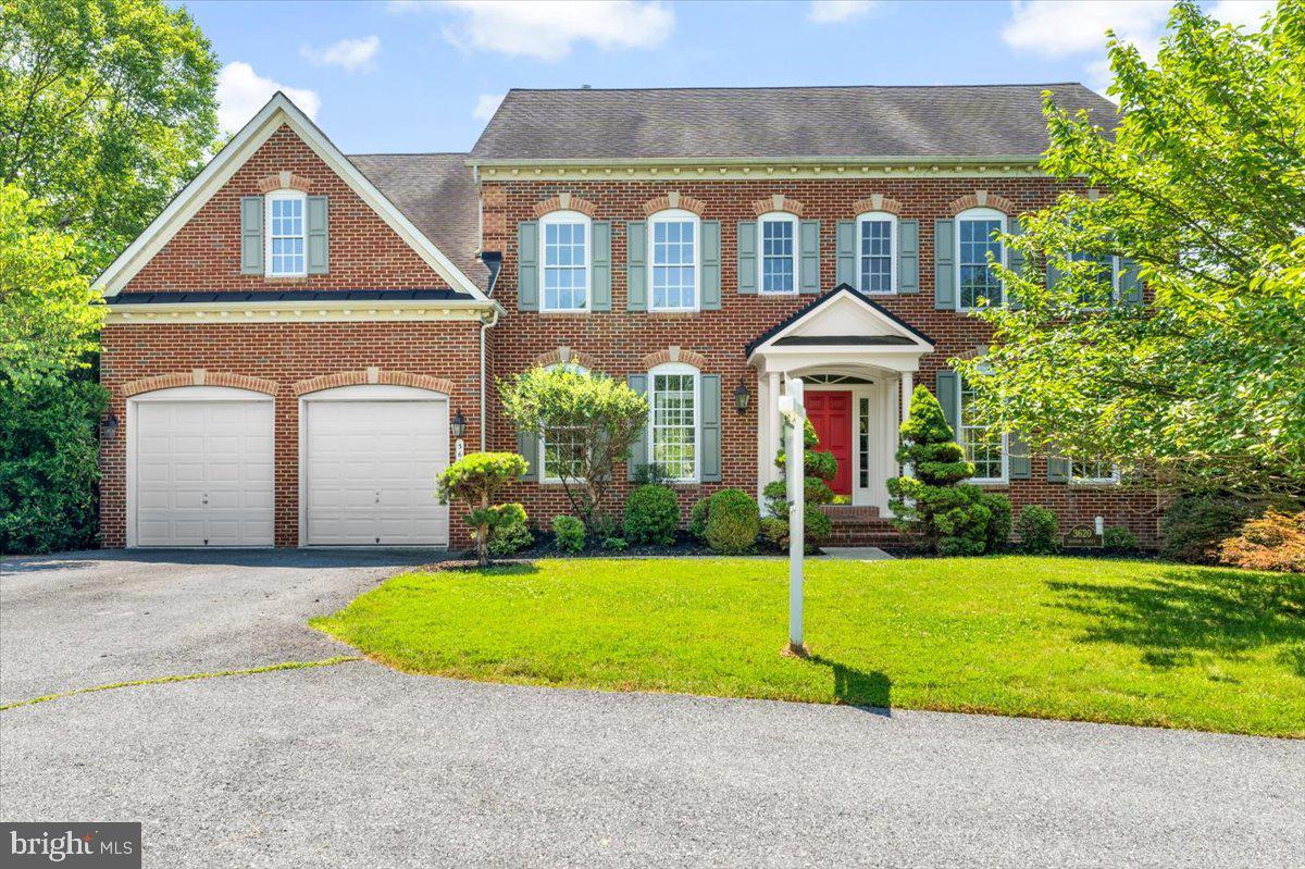 Stunning NV detached home on highly sought-after Denison Street in The Villages of Urbana, showcasing a classic brick front and a fully fenced backyard, perfect for outdoor games and entertaining.
Inside, you'll find newly refinished hardwood floors throughout the main level, complemented by elegant crown molding and floor-to-ceiling windows in the formal living and dining rooms, as well as the dedicated home office. The gourmet kitchen boasts stainless steel appliances, a large island, designer backsplash, and opens to a bright breakfast room with direct access to the deck. The adjacent family room features a cozy gas fireplace and stunning natural light.
Upstairs, the expansive primary suite impresses with two sitting areas, custom walk-in closets, and a spa-like ensuite bath with a soaking tub, separate shower, and private water closet. Bedrooms 2 and 3 share a Jack & Jill bath with a privacy door, while Bedroom 4 offers its own private ensuite with designer wallpaper and lighting. The 4th floor hosts Bedroom 5, complete with a sitting room and full bath—ideal for guests, teens, or a private retreat.
The fully finished lower level offers flexible space for a third family room, gym, or media area, plus a large storage room and a bonus room with potential for a doggie shower or mudroom. Walkout access through double doors leads to the flat backyard, perfect for relaxing or entertaining.
Don't miss this rare opportunity to own a beautifully appointed home in one of the area’s most desirable neighborhoods! Blue ribbon school district of Urbana High School, close to I270, shopping and dining.