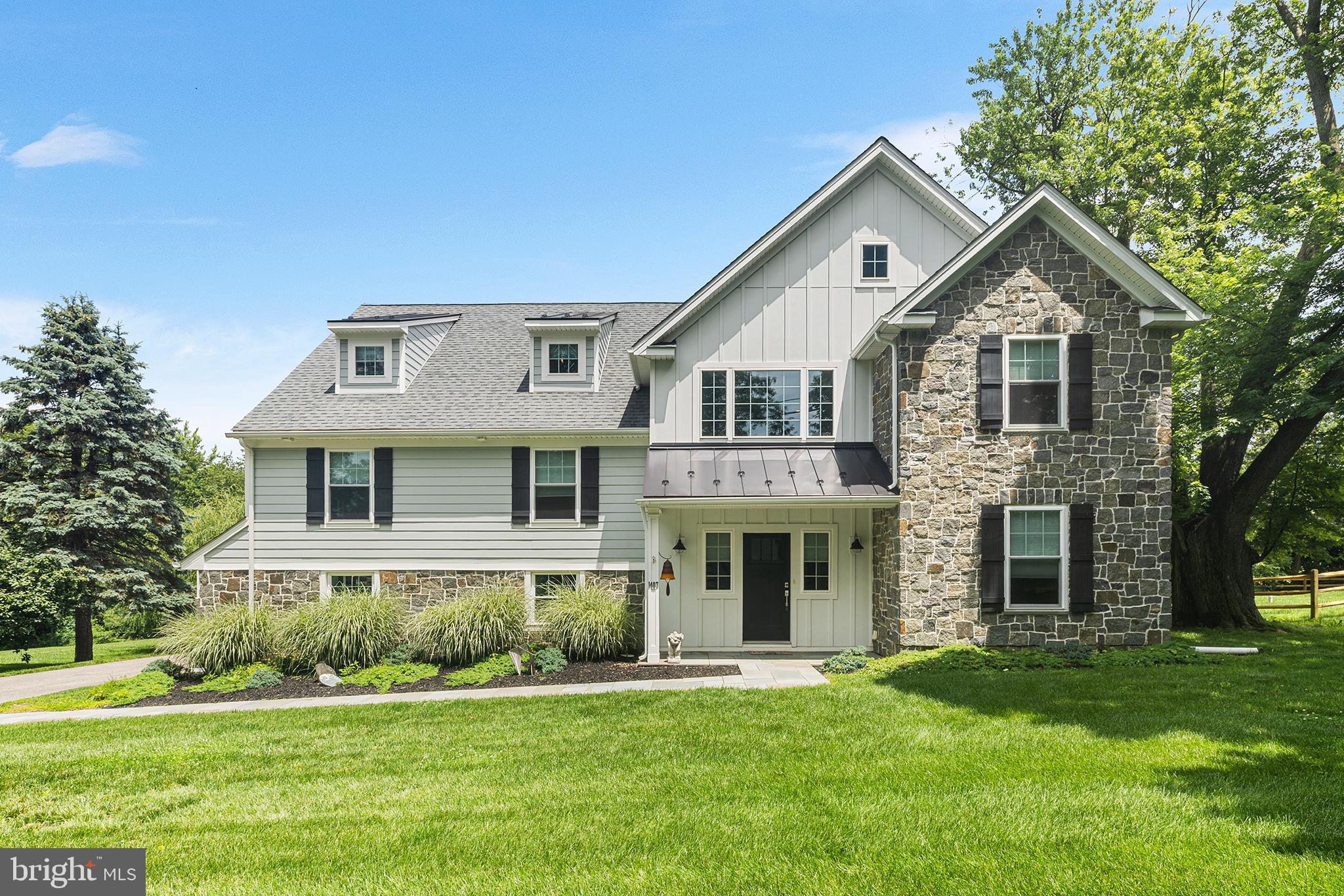 Your dream home awaits at this like-new 9 year young Stone Colonial with 6 beds / 4.5 baths situated on oversized flat 0.68 lot in award winning Lower Merion School District. With 4,878 Finished Sqft of luxurious living space, open floor plan and numerous upgrades, 1407 Hagys Ford will meet the demands of the most discerning buyers.
Upon entering the over-sized Foyer with cathedral ceiling, you'll immediately notice the open floor plan, 4" site finished hardwood flooring and custom millwork. A Private Study off the Foyer offers privacy for those zoom calls and the formal Living Room with gas fireplace will be your go-to space for entertaining. The Living Room flows into the Dining Room with a built in cabinetry and countertop that delivers convenience during holiday celebrations. The dreamy white Kitchen is flanked by a 5+ pp seated island and offers Quartzite countertops, custom cabinetry, Jenn-Air stainless steel professional appliances, pantry and tons of storage. The Kitchen is open to a 2-story breakfast room with doors leading to a large timber tech deck. The Kitchen/Breakfast area is also open the perfect amount to the Family Room with gas fireplace and numerous windows for a backyard view.
Ascend the stately staircase with Shaker Panel wainscoting to the second floor. Here you will find 6 spacious bedrooms, 3 of which are En-suites. The Primary En-suite with vaulted ceiling offers everything you could dream of: two walk-in closets, a private sitting area (or possible third walk in closet), bonus reading room, and spa-like Primary bath with his/her vanities, free standing tub and expansive window overlooking beautiful private rear yard.
The Second Bedroom En-Suite currently doubles as a movie room. Three additional Bedrooms share a sizable Full Bath and the 6th Bedroom is enormous with an En-suite Bathroom with stall shower, desk nook, gaming area, sitting area and built-ins. With it being located at the top of the main stair case, the 6th Bedroom has also been used as a play room like one would use a basement. Completing the second floor is the Laundry Room of all laundry rooms with ample folding counters and storage for your supplies and linens.
The Lower level has a big mudroom and closet for storing coats, shoes, backpacks and more as well as access to side and back yards, basement, 3-car oversized garage and a powder room.
1407 Hagys Ford's color palette is neutral whites, grays and blues and offers various upgrades include a generous LED lighting, 3 zoned HVAC systems, security system, Quartzite countertops and much more. The exterior offers a combination of natural stone and Hardie plank siding for low maintenance and a highly sought after look. This home is an excellent opportunity to live in walking distance to Welsh Valley Middle School and situated minutes driving distance to Center City. Don't miss this move-in ready home.
*SwimSpa in backyard is not working and will be removed by Seller before settlement. Concrete pad will remain for next buyer to create their dream patio.
