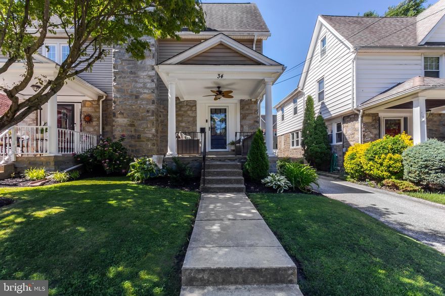 If you are looking for a completely turnkey home in the heart of Springfield with an open floor plan, great natural light throughout and versatile space, this is it! This 3+ bedroom gorgeous twin home with an inviting open front porch, detached garage, back patio and adorable curb appeal.  The first floor offers a great open floor plan, gleaming with natural light, front to back.  The living room with fireplace with custom surround and mantle accommodates a large sectional and flows right into the dining room!  The kitchen has been renovated to include white shaker cabinets, recessed lighting, tiled backsplash and newer appliances.  Access to the backyard from the kitchen is super convenient.  Hardwood floors span throughout the first floor for a nice clean and cohesive space.  Admire the beautiful trim work and staircase details as you sit and relax.  The 2nd floor has a great sized primary bedroom with double closets, 2 other bedrooms and a renovated hall bath!  The 3rd floor walk up offers a great bonus space!!! This can be a 4th bedroom, rec room or home office as the current owners use the space.  The 3rd floor also houses the washer and dryer!!!  The lower level is finished to include a large living space and half bath, perfect for entertaining, play, guest space or another great office.  The detached garage, back patio and backyard offer space that everyone desires.  The current owners have done a beautiful job with this home, inside and out.  It’s clean as a whistle and ready to move into!  Great location in the heart of Springfield offering walkability to parks, schools, public transportation and places to eat!  A great buy in Springfield Townshiip