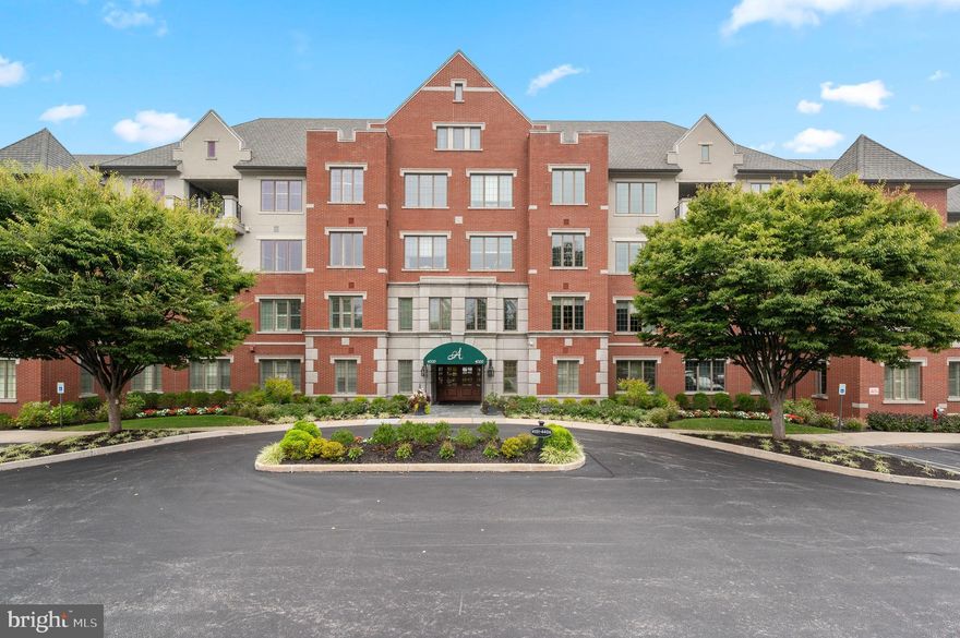 Welcome to Athertyn!  This 2BR + Den, 2.5 Bath corner residence offers light-filled one-floor living with a private terrace overlooking the peaceful parkside setting of Haverford Reserve. From the moment you enter, you are welcomed by signature Pohlig craftsmanship, including double arched cased openings, wainscoting, crown molding, and finely detailed millwork carried throughout. The main living areas are enhanced by hardwood floors and a custom, floor-to-ceiling fireplace that serves as an inviting yet refined focal point.  The gourmet Kountry Kraft kitchen, paired with a bright and airy morning room, is both beautifully appointed and highly functional—ideal for everyday living as well as entertaining. Offering 2 bedrooms, 2.5 baths, and a full-sized laundry room, this home balances comfort with convenience. The primary suite provides a serene retreat with generous walk-in closets and a spa-inspired bath featuring natural light, an oversized shower, and a soaking tub. A private den with custom built-ins adds versatility as a study, library, or home office.  At Athertyn at Haverford Reserve, residents enjoy the ease of low-maintenance living within a 209-acre community designed around preservation and natural beauty. Miles of walking and biking trails weave through the landscape, while exclusive amenities include a clubhouse, pool and spa, tennis court, putting green, and gardens. Combining timeless architectural detail with the comfort and ease of single-level living, this residence offers a refined lifestyle in the heart of the Main Line.