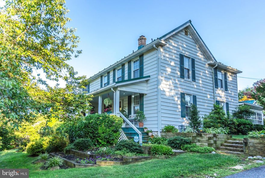 WONDERFUL RUXTON COTTAGE WELL MAINTAINED WITH MANY UPDATES.  IN-LAW SUITE LOCATED ON MAIN LEVEL .4 BEDROOMS WITH 2 1/2 BATHS THE 5TH BEDROOM IS PART OF THE IN-LAW  SUITE WHICH CAN BE OPENED AND  EXPANDED TO ADD A MAIN LEVEL MASTER SUITE.  CHARMING SPACIOUS  DECK WITH POND.  PERFECT FOR  OUTDOOR ENTERTAINING . SURROUNDED BY LUSH LANDSCAPING ON QUAINT STREET.  NEW METAL ROOF