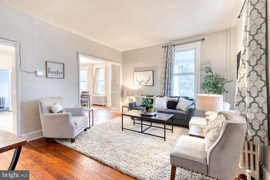 Welcome Home to 4307 Springwood Rd! This 3  Bed/ 1 1/2 Bath, adorable Cape Cod with a charming wrap around porch on a beautiful tree lined street in Cedmont! Featuring hardwood floors and tall ceilings,  Freshly painted throughout,  Bright & Airy Living Room, Formal open concept Dining Room, Sitting Room or Playroom. Large kitchen with newly updated appliances. Recently renovated large mudroom with Laundry. The back entrance mudroom has potential for an additional main level full/half bath. Upstairs features three spacious bedrooms, large closets and recently renovated full bath. Walk-up attic for easy access and plenty of storage. Enjoy nearly a half-acre of backyard with mature landscaping including native plants and a garden infrastructure with raised beds and Drip irrigation system! Long driveway that leads to a one car garage for all your tool and gardening needs. Many more updates and upgrades. The adjacent lot is deeded separately as 4305 Springwood Rd but is included in the sale of 4307  Springwood! . Enjoy neighborhood walks to popular surrounding restaurants and shops.