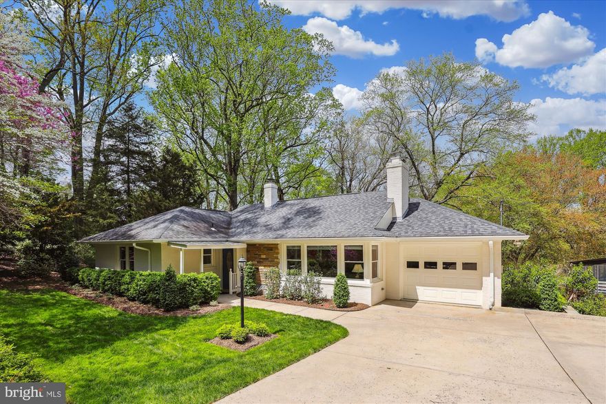 *GORGEOUS* 4BR/3BA brick home on 2 spacious finished levels situated on 1+ acre lot in sought-after Chesterbrook neighborhood. This lovely home sits back on the lot, with an expansive backyard featuring mature trees and manicured beds with beautiful plantings. As you step inside from the picturesque walkway and covered porch, you’ll be greeted by a sun-filled living room with wrap-around corner windows and a wood burning brick fireplace. This living area flows into the large dining room with a huge picture window and walk-out to an expansive deck overlooking the beautiful back and side yards for entertaining family and friends. The updated gourmet kitchen includes granite countertops, stainless-steel appliances, recessed lighting and new LVP (2024). Adjacent to the kitchen is a large pantry room which provides practical transition space and extra storage. The main level features beautiful custom hardwood oak floors throughout, with a primary bedroom and ensuite, plus two additional bedrooms and full-size hall bath. The lower level offers a huge recreation room with wood burning fireplace and walk-out to the lower-level patio area overlooking the grand backyard. Completing this level is a fourth bedroom and full-size bathroom. A stylish door leads to the laundry room with an area for exercise and/or use for storage. Come see this lovely home that is nestled back on a thoughtfully cultivated lot to maximize privacy and views, where beautiful magnolias, azaleas, boxwoods, and rhododendrons abound! Take advantage of having this huge, fenced backyard for relaxing with family, friends, and pets.  Walk-up attic and storage shed at the right side of house.  Located across from the 25-acre Mary Leven Sanctuary Park! Enjoy the convenience of being close to GW parkway, Tyson’s, and the center of McLean! Chesterbrook, Longfellow, and McLean Schools, with one light to DC!