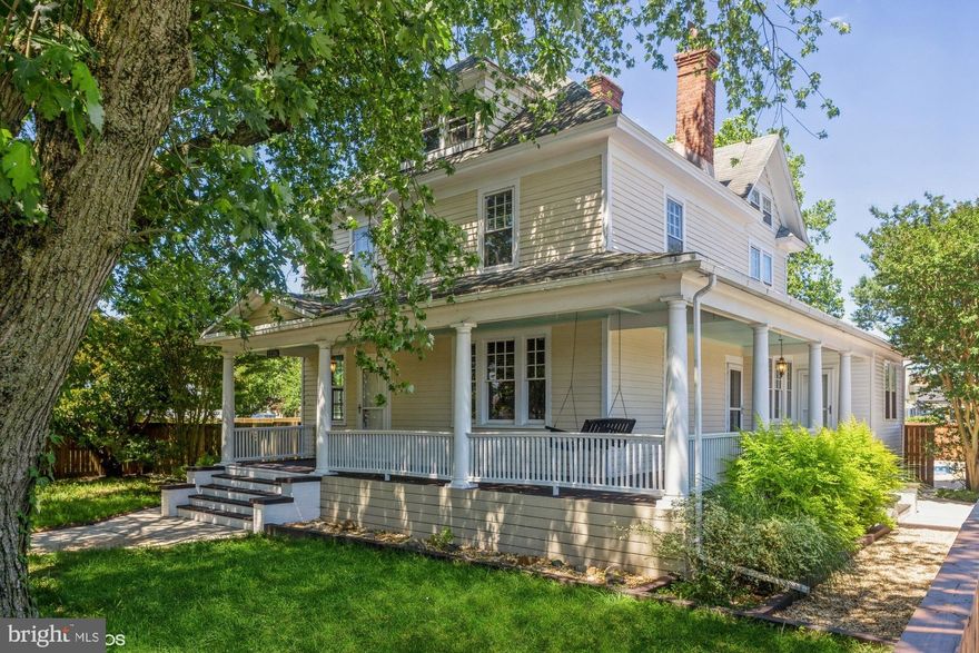 Welcome home to this lovingly updated home with huge private oasis on a corner city lot.  Walking up you'll fall in love with the welcoming wrap around porch, mature landscaping and fenced perimeter affording lots of privacy.  This stately home is nestled on two city lots with plenty of green space and an oversized salt-water pool that has recently had a new liner installed.  Entering you'll immediately appreciate the gorgeous natural hardwood floors, detailed woodwork, lovely French doors and gorgeous wood burning fireplaces with custom ornate mantles and screens.  On the first floor you'll find formal and informal living and dining spaces and a beautifully updated kitchen with glass tile backsplash and upgraded Stainless Steel appliances including an oversized fridge, gas stove, dishwasher and built-in microwave - ALL the modern conveniences!  Off the kitchen you'll find the walk - in pantry and cozy sun porch with sliders leading out to the lovely fenced yard  and pool area.  Homes of this era rarely have first floor beds or baths but this one does - in fact it has a first floor bedroom with connected 1/2 bath and an additional full bath!  Talk about a dream come true!!  Taking one of the dual staircases you'll make your way upstairs where you'll find 2 more amply sized bedrooms - which could be used as an office or nursery - and another oversized & remodeled full bath.  Moving to the 3rd floor is where you'll find the huge, finished flex space, perfectly suited for a play area, workout space or game room AND there's still a walk-in attic with lots of room for storage!  Last but not least, there is an awesome basement with MORE storage, easy access to equipment plus the laundry space with folding/drying area.  Heading outside you'll find yourself dreaming of pool parties or quiet days lounging by the pool.  Either way you'll love all the space and privacy this unique property affords.  Finally, within the fenced yard, you'll also find two additional storage sheds and an oversized detached 2 car brick garage with concrete driveway, featuring two additional off-street parking spaces.  There is also potential to subdivide this double lot giving buyers the ability to sell the extra lot if desired.  This home checks off ALL the boxes so don't hesitate to see this charming, well-loved home before it's GONE.  Note that tax record square footage does not reflect the finished 3rd floor bonus space or the unfinished basement square footage.