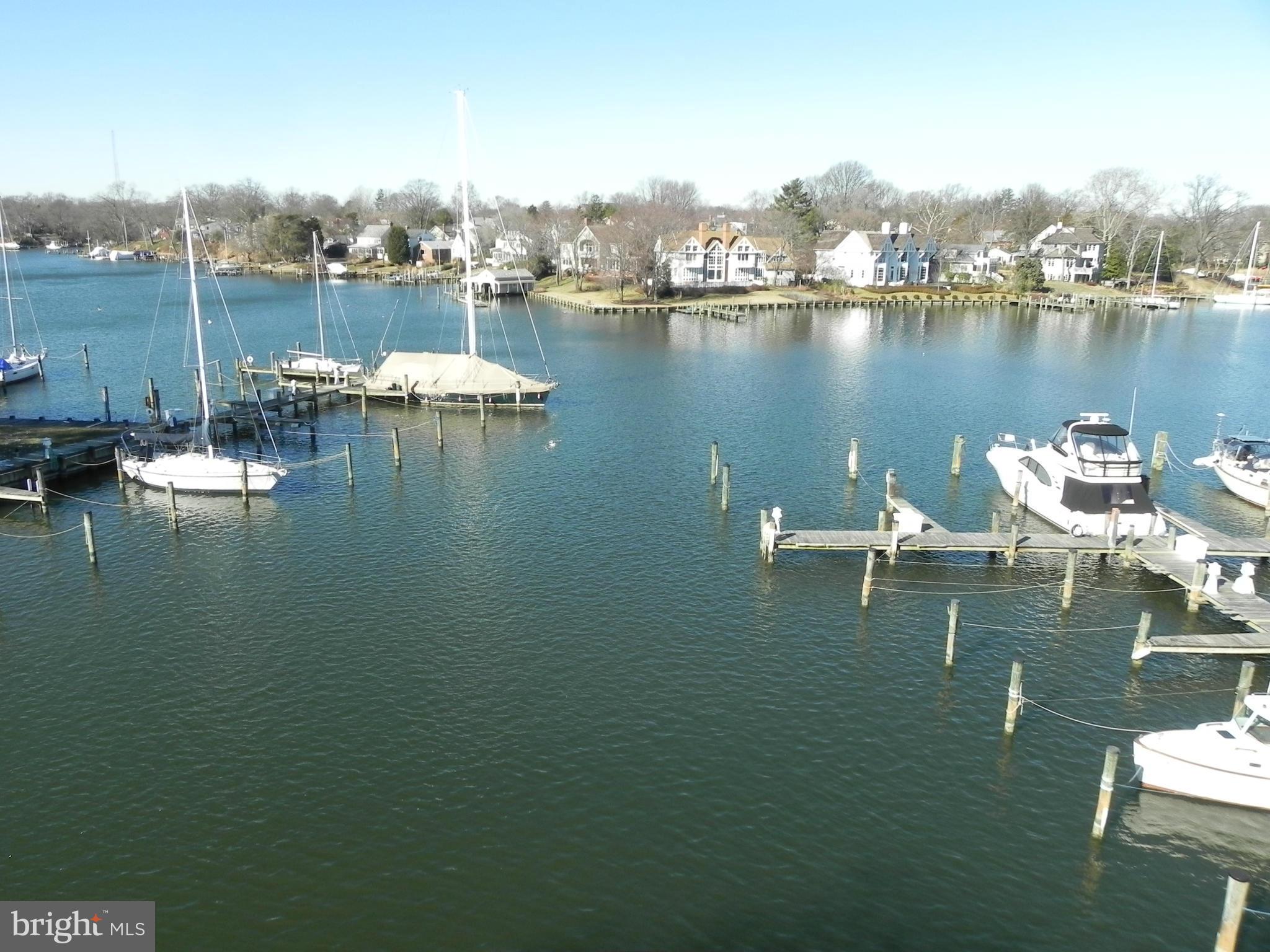 IT'S ALL ABOUT THE VIEW FOLKS! THIS GEM OFFERS A SPECTACULAR VIEW OF SPA CREEK, AND YOU CAN'T BEAT THE LOCATION! IMMACULATE 2 BR 2 BATH WF CONDO WITH UPGRADED BATHS & APPLIANCES. LOVELY LIVING ROOM W/ VAULTED CEILING, FP, & BUILT INS. ALL LIGHTING FIXTURES REPLACED. NEWER FURNACE & HOT WATER HEATER (2010), NEW BR WINDOWS & AWNING (2013). GATED WATERFRONT COMMUNITY W/ POOL, TENNIS, SLIPS, ETC!