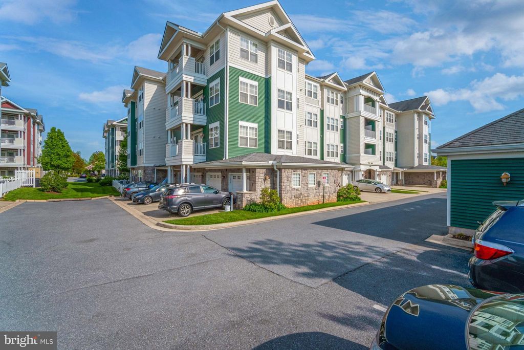 Photo of 13501 Belle Chasse Blvd #215, LAUREL, MD 20707 (MLS # MDPG2181148)