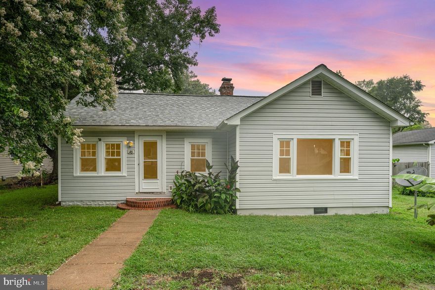 NEW PRICE and $2,500 CLOSING CREDIT TO BUYER with acceptable offer! This cute Beach cottage is move-in ready and has recent updates --new appliances, new roof, and fresh paint.  Located in the Classic Shores section of Colonial Beach and just over a block from the Potomac River, this home sits on a large 75' x 100' lot and offers wood floors and a cozy, wood-burning fireplace in the living room (just cleaned and inspected); a spacious eat-in kitchen with pantry; central heat and air (HVAC 2018 and just inspected); large utility room and a fenced backyard with rear deck and cinder block storage building. Colonial Beach has the second largest public beach in Virginia.  Restaurants, marinas and shopping are close by.   A great weekend retreat or full-time residence less than 90 minutes from the DC metro and Richmond areas.   Bring your golf cart and join in on the fun in this laid-back Northern Neck town.