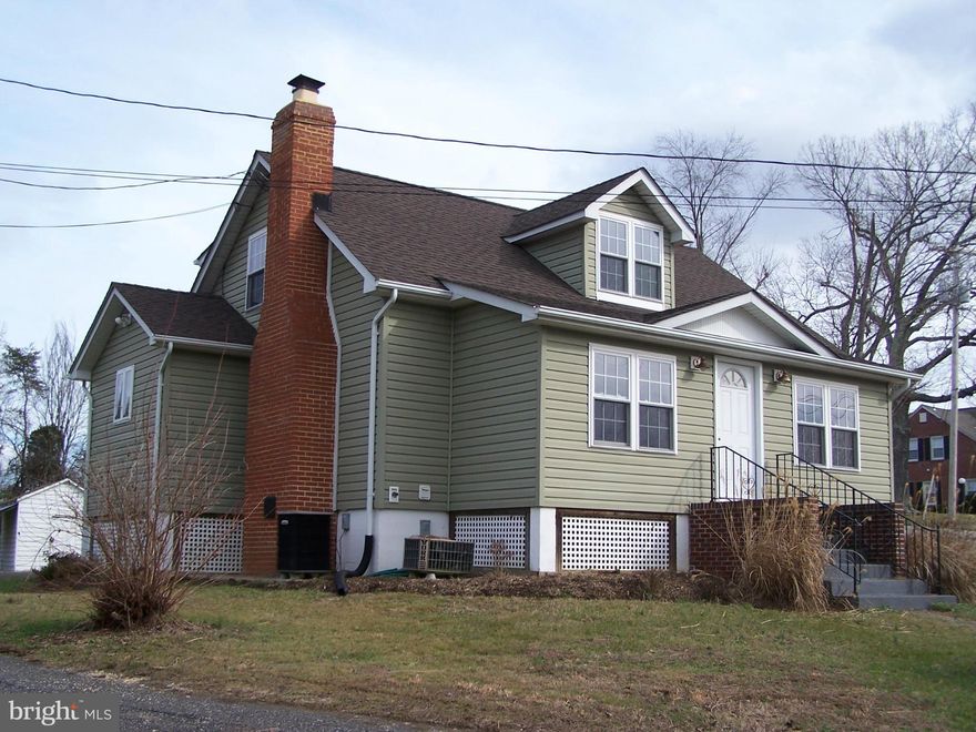 Enjoy the peace and quiet.  Located right in Hughesville.  Dual zone HVAC, fireplace, enclosed porch/front room, two full baths, first floor master bedroom with walk in closet.  Large closets throughout.  Big country kitchen with a large walk-in pantry.  Just over one acre lot.