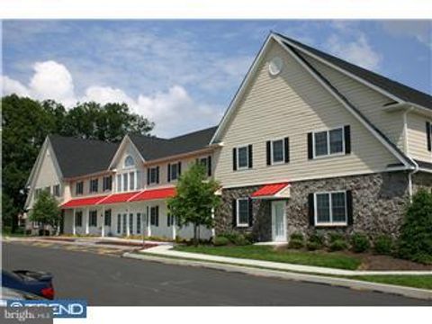 Photo of 115 Pheasant Run #SUITE 218, NEWTOWN, PA 18940 (MLS # PABU2107416)