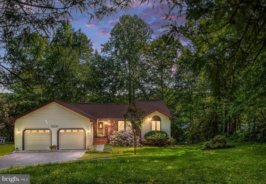 Experience waterfront living at its finest in this stunning property, designed to enhance every aspect of your lifestyle. As you enter the foyer, feel the inviting warmth of the bright living room to your right, setting the stage for the tranquility ahead.

Next to the foyer is a cozy family room, seamlessly connected to the kitchen, featuring high ceilings, skylights, and a charming stone-faced fireplace – the ideal spot to unwind on chilly nights. Two spacious bedrooms and a full tiled bathroom offer comfort, while nearby laundry adds convenience to daily living.

The kitchen, the heart of our home, exudes light and serenity, equipped with stainless steel appliances, ample storage, and captivating water views through the window filled sunroom.  Flowing into the dining area and spacious living room, it's perfect for entertaining guests or spending time with family and friends.

Escape to the primary suite, a haven for relaxation. Treat yourself to a bath, enjoy the separate large shower as well as two adjacent closets. From your retreat you can step onto the screened porch, where mornings are made for coffee and panoramic water views.

From the family room you can enter the sunroom and step outside to explore a sprawling deck that leads back to the screened porch. This outdoor space is accessible from the dining and living areas as well, providing the ideal setting for outdoor gatherings or moments of solitude amidst nature's splendor.

The lower level boasts a spacious recreation room, a game room, full bath, a bedroom, and a bonus room, and a fireplace all with lower deck access offering endless opportunities for leisure and fun.

Outside, lush landscaping with trees, flowers, and bushes creates a welcoming retreat. A short walk leads to your private dock with a lift, granting easy access to the serene waters that await.

Enjoy waterfront living in a vibrant community filled with amenities including beaches, community center, tennis courts and more! Discover the perfect blend of comfort and natural beauty at this waterfront retreat. 
Minutes to the charm of Fredericksburg, downtown Culpeper, historic sites, shopping, restaurants and more! Welcome home.