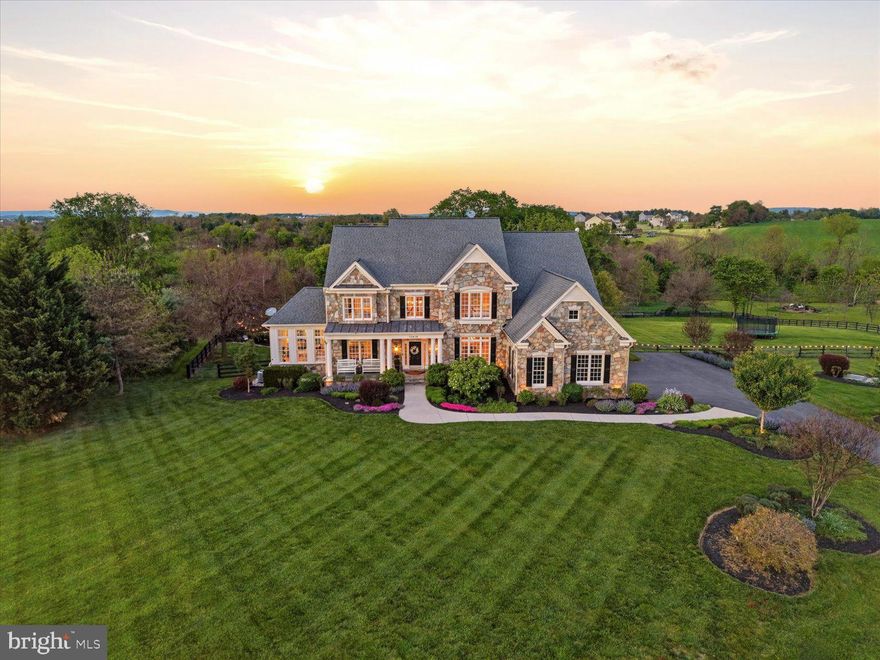 Tucked away on a beautiful 4.4-acre cul-de-sac lot in Lovettsville, this stunning property is the definition of a showstopper — where luxury, comfort, and everyday fun all come together in the best possible way. From the moment you arrive, this home feels like the kind of place where memories are made, holidays are hosted, and everyone naturally wants to gather.

The backyard is truly next level and feels like your own private resort featuring a gorgeous pool, expansive covered patio, spacious deck, and fire pit area that practically begs for summer parties, cozy fall evenings, and unforgettable weekends with family and friends.

Inside, every inch of this home was thoughtfully designed with style and purpose — not a single space goes unused. The oversized kitchen is the heart of the home with incredible gathering space, abundant cabinetry, and room for everyone to spread out while still feeling connected. A bright and inviting solarium adds the perfect extra living space for morning coffee, quiet evenings, or soaking in the backyard views year-round.

The fully finished lower level is an entertainer’s dream featuring a massive recreation area with fireplace, private movie theater, additional bedroom and full bathroom, plus the most adorable tucked-away nook that makes the perfect kids’ corner, reading hideaway, or creative play space.

Upstairs, the spacious bedrooms provide comfort, flexibility, and room for everyone to recharge.

This is more than just a beautiful home — it’s a lifestyle property with the kind of warmth, character, and entertaining spaces buyers dream about but rarely find.