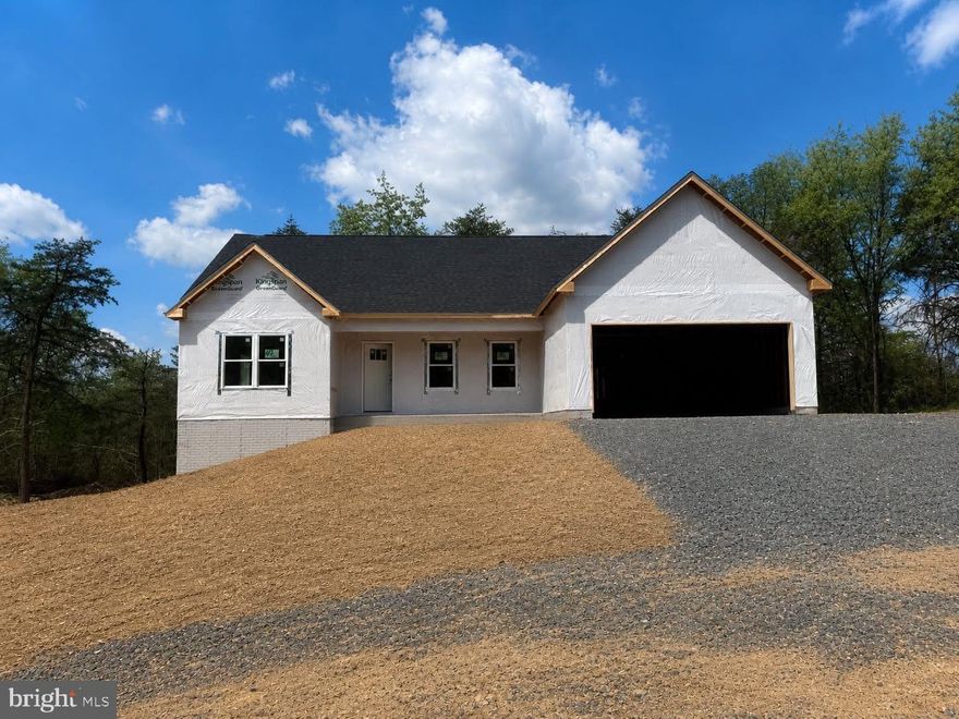 Nice new construction home , under roof . 2± Acres –  3 Bedrooms, 2 Bathrooms, Unfinished Basement.
Discover the charm and convenience of single - level living in this beautifully designed to-be-built ranch-style home, perfectly situated on 2.2±  acres of partly wooded land. Offering the ideal blend of privacy, nature, and modern comfort, this home provides a peaceful setting while maintaining close proximity to everyday amenities. The thoughtful floor plan includes 3 spacious bedrooms and 2 full bathrooms, with an open-concept main living area designed for both functionality and style. Large windows invite natural light throughout, showcasing the scenic wooded backdrop that surrounds the property.
Downstairs, the full unfinished basement offers endless possibilities — featuring a rough-in for future plumbing, it’s ready for your vision- additional living space, a recreation room, home gym, or storage area to suit your needs. Some color selections you are still able to pick from .