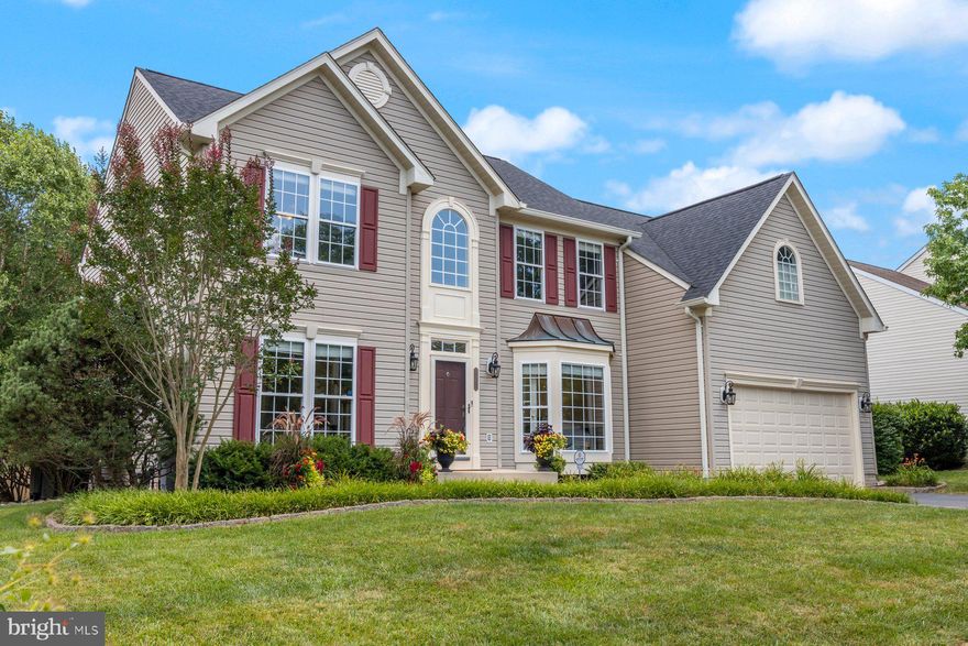 Move right into one of the largest homes in sought-after Stone Manor! A two-story foyer and hardwood floors greet you as you move through this beauty. There’s a separate, light-filled home office on your right with a view out the bay window, and a few steps farther gets you into the expansive gourmet kitchen with eat-in kitchen island. Bring your large farmhouse table because there’s plenty of space in the breakfast area. Four large windows and a door that leads to the deck fills the kitchen with natural light. The slightly sunken family room is expansive, with cathedral ceilings, a gas fireplace, and a 2nd stairway to make it even easier to get the kids to bed! A formal dining room and living room (or play area) augment the main-level living area, and both rooms are lined with hardwood flooring. With a powder room and main-level laundry that doubles as a mud-room from the garage, you’ve got all you need for family space and functionality! Upstairs you’ll find a large primary bedroom with tray ceilings, an attached full bath that has double vanities, soaking tub, and stand-up shower. Also, space is large enough for a sitting area or your exercise equipment. A generous walk-in closet with separate areas for two is an added bonus! The three additional bedrooms are all good sized, with the largest big enough to handle two beds. The shared bath upstairs was done in 2022. 

Enjoy some wine and grill some of your favorites on the composite deck, and bring the pups -- the yard is fenced in and has privacy trees to help keep gatherings private. The lower level is fully finished with its own private guest room and full bath with a large stand-up shower. Plenty of rec space, a bar, a “mini-office” area (or for gaming!), and a cool elevated nook where the littles can have sleepovers. Bonus crawl space on LL provides ample room for storage. There is egress downstairs via a walk-up stairwell. HVAC, water heater, roof, all under 5 years old. Make your appointment today or visit the Open House on Sunday, July 14th!