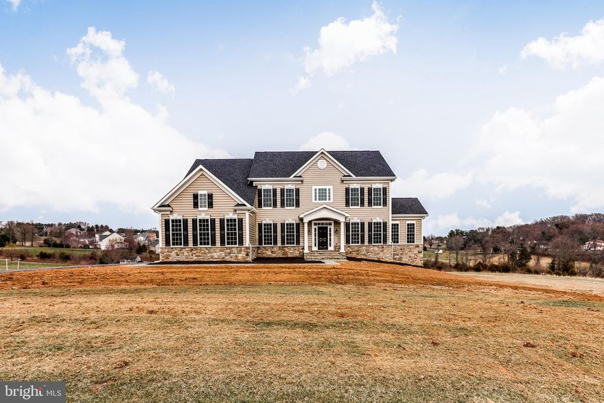 To Be Built – Rainier Model by JMB Homes

Welcome to your future dream home—designed and constructed by JMB Homes—on a private and picturesque double lot along scenic Coon Club Road. Nestled in the heart of nature with streams, mature trees, and rolling hills as your backdrop, this serene setting offers the peace of country living just minutes from local conveniences.

This custom Rainier model showcases over 3000 square feet of finished space with elegant architectural details, open-concept living, and high-end finishes throughout. The main level features plank hardwood flooring, a gourmet kitchen with granite or quartz countertops, custom cabinetry, and an upgraded stainless steel appliance package. The spacious family room includes a cozy gas fireplace and oversized windows that frame your wooded view.

Upstairs, you’ll find four generously sized bedrooms including a luxurious owner’s suite with tray ceiling, walk-in closets, and a spa-inspired bath with soaking tub and dual vanities. Each secondary bedroom includes its own return air duct for comfort and efficiency. The walk-out lower level offers endless possibilities—recreation room, guest suite, or media lounge—tailored to your lifestyle.

Situated on a rare double lot totaling over 4.5 acres, enjoy private access to streams, natural trails, and abundant wildlife—all without sacrificing modern amenities. 

This is a unique opportunity to build a one-of-a-kind estate in Carroll County with a reputable local builder. Choose your finishes, finalize your layout, and create the custom home you’ve always envisioned.

Offered at $889,990 including land, construction, and $10,000 in closing cost assistance.  

Looking for another model?  Don't fret.  JMB Homes is a Custom Home Builder who has many floor plans to choose from and is able to work with you on custom plans.    

Photos are representative of similar models built by JMB Homes that may include upgrades.  Pricing will reflect final selections.

Builder Tie In is Optional, Lot also available for sale on its own.  Check out MLS #MDCR2026658