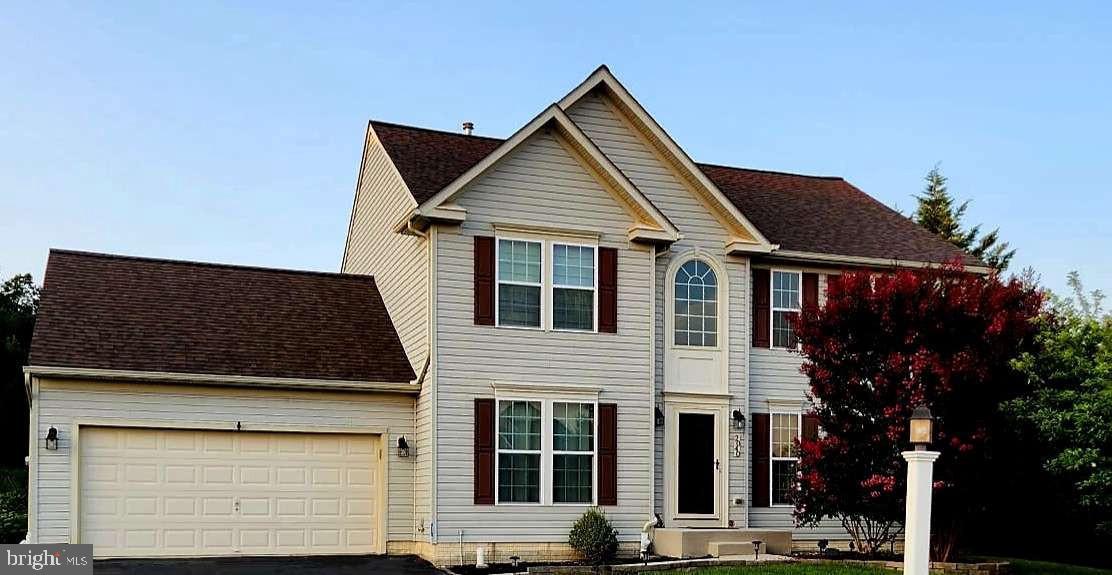 Welcome to your new home! 4 bedroom 3 bath colonial with 2 car garage on almost an acre of beautifully landscaped grounds with patio in South Hanover community, South Western School District. Yard offers unmatched privacy through natural, mature, tree lined borders and is perfect for large or small group gatherings in any season. The 1st floor features a dining room, sitting room or home office, kitchen, bathroom, morning room, living room, gas fireplace with floor to ceiling stone surround, and stunning views of the outdoors. Kitchen has a large island perfect for meal prep, storage, and entertaining. 2nd floor features a master suite with master bath, vaulted ceiling, French door, walk-in closet, and additional closet. Three adjacent bedrooms, full bath, and laundry room on 2nd Floor. Easy to clean hard flooring throughout 1st & 2nd floors. The spacious lower level offers another great space for entertainment as well as a significant storage area or potential room and bathroom. Wide stairwell entry/exit to yard from lower level. Neighborhood has nature walking paths, low annual HOA fee, and is conveniently located to shopping, restaurants, Codorus State Park, and MD line for easy commute. Don't miss the opportunity to make this home yours!